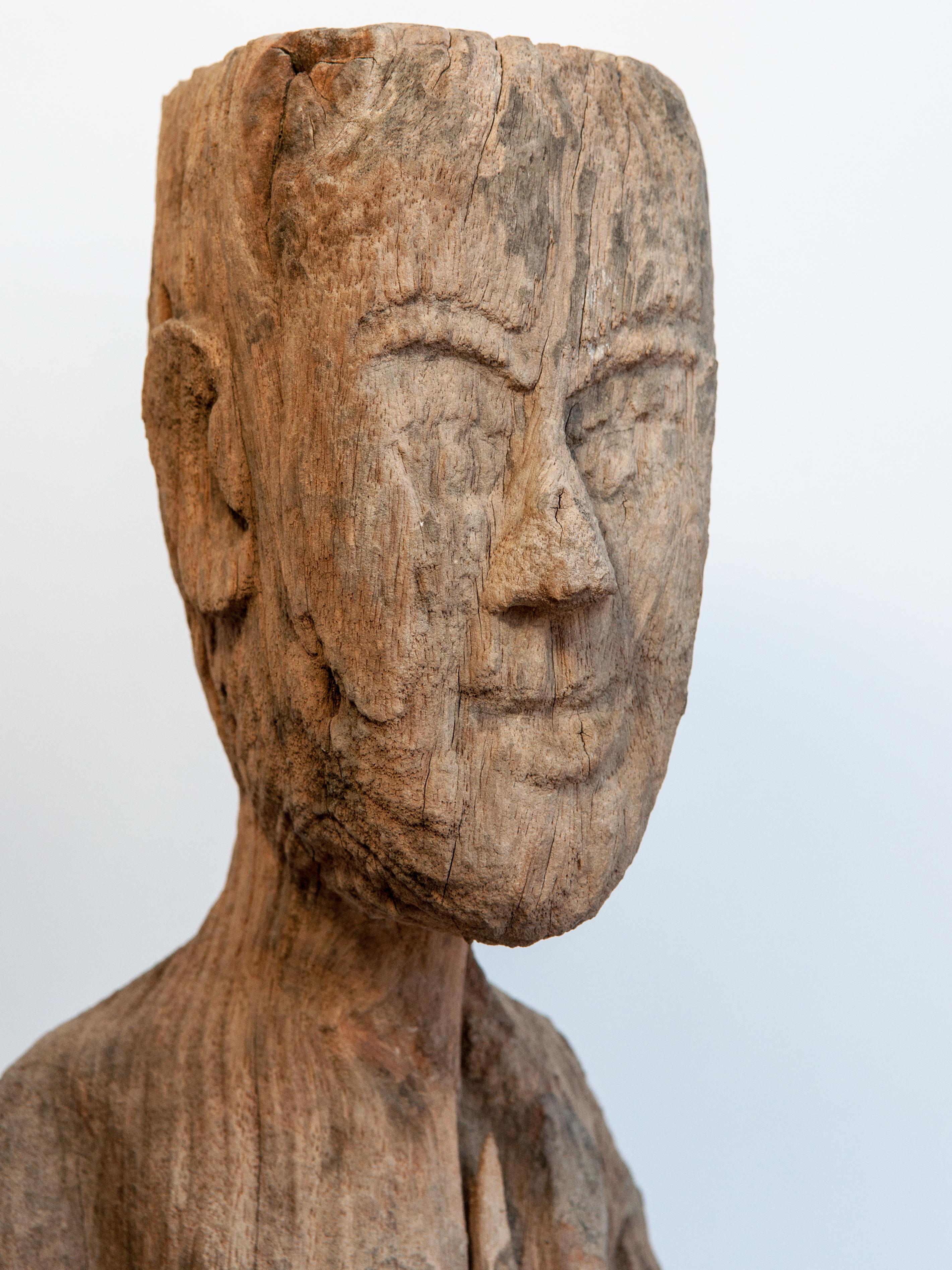 Old carved wooden figure. South or Southwest China, early 20th century. Mounted.
This is of unknown origin. Possibly hill tribe. Possibly Yao?
Condition: The statue has clearly been exposed to the elements and has experienced significant