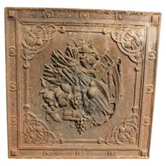 Ancienne plaque de cheminée en fonte, richement sculptée, Italie