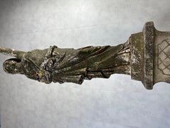 Old cast iron torch in the 19th century