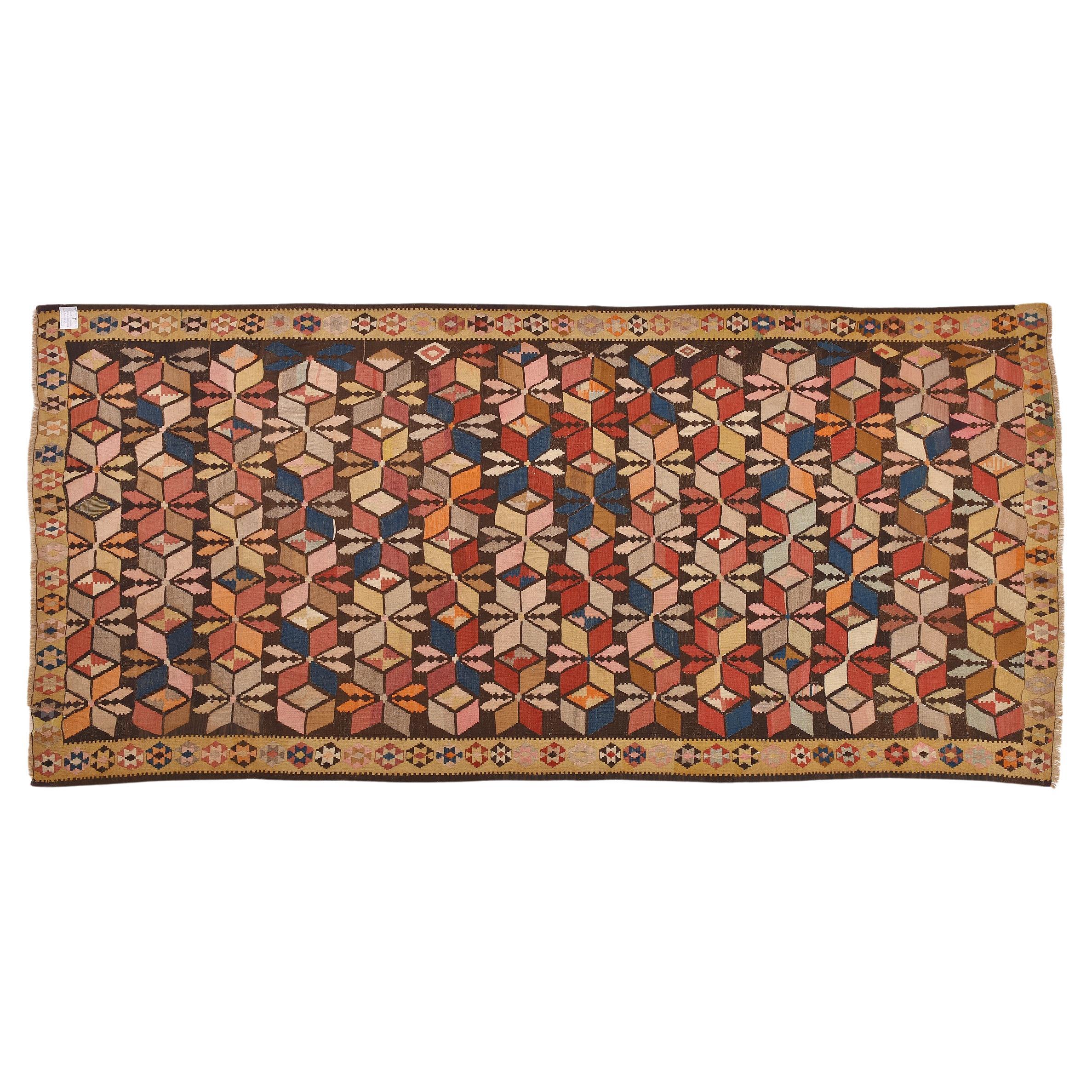nr. 128 - Ancient Caucasian kilim particularly interesting for its design and colours.
Those who know the technique of weaving carpets and kilims know how difficult it is to create this type of decoration on a loom, on a fine blue background in this
