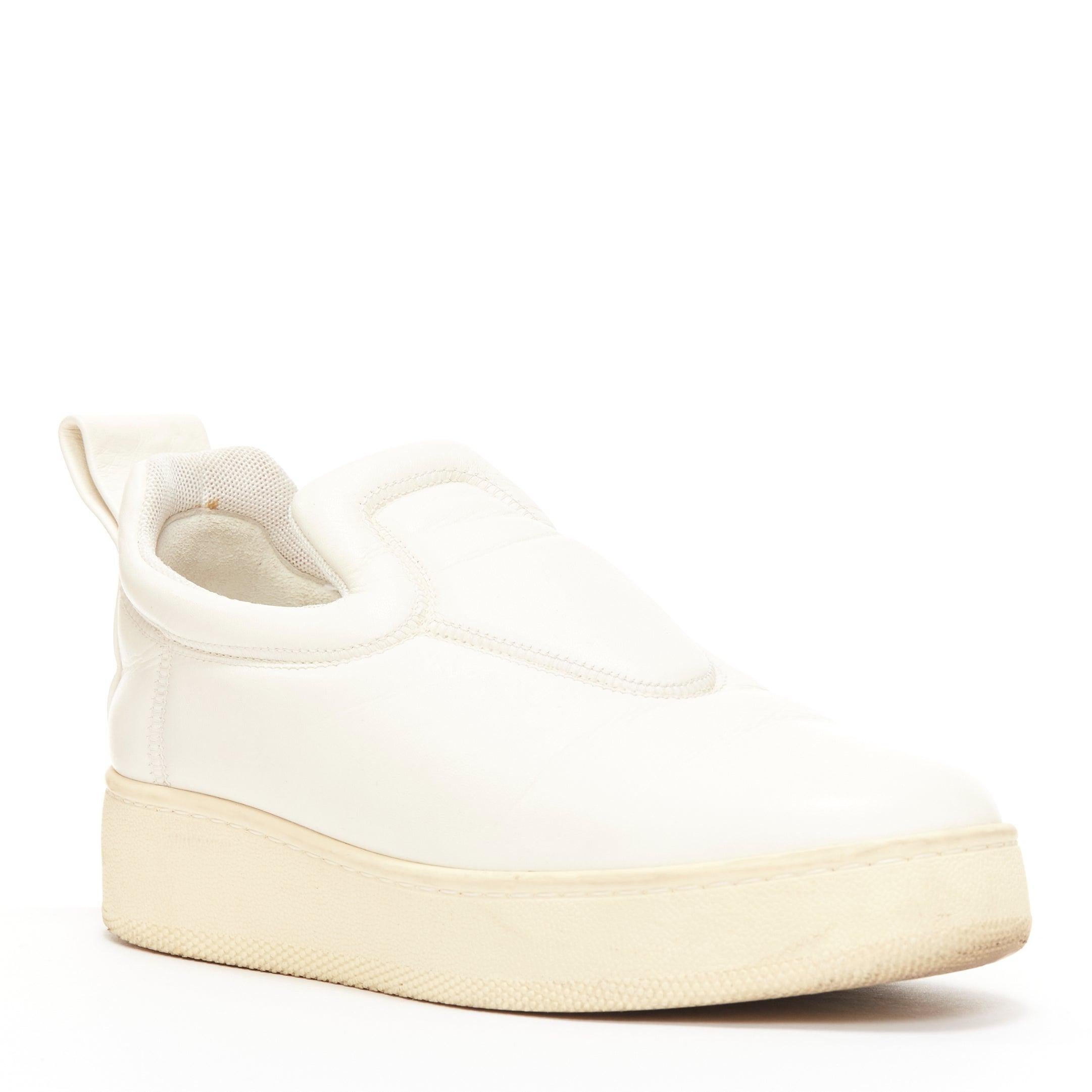 OLD CELINE 2015 cream leather padded logo tab platform skate shoes EU35
Reference: YIKK/A00151
Brand: Celine
Designer: Phoebe Philo
Collection: 2015
Material: Leather
Color: Cream
Pattern: Solid
Closure: Slip On
Lining: White Leather
Extra Details: