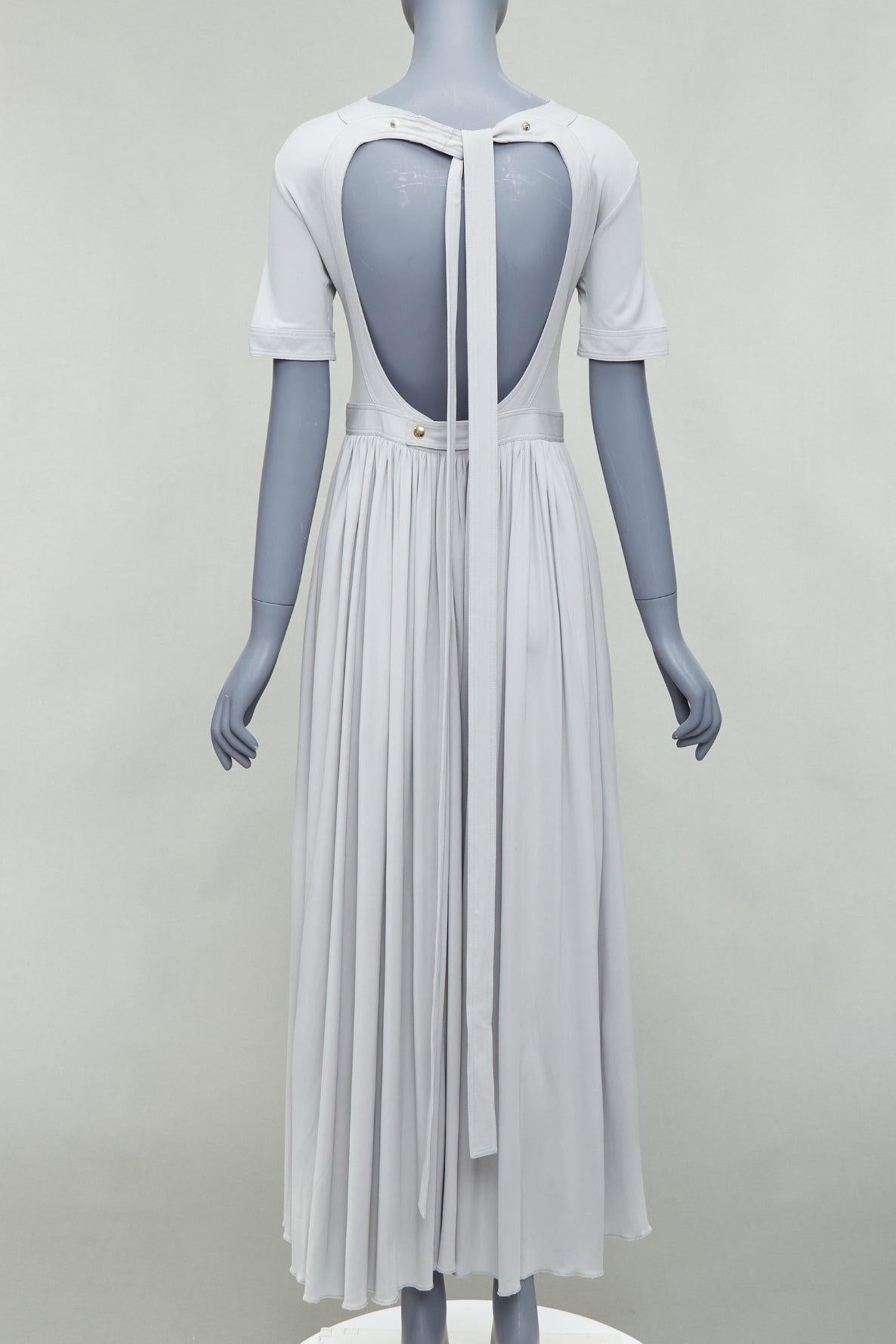 OLD CELINE 2016 grey open tie back short sleeve midi dress FR38 M
Reference: TGAS/E00156
Brand: Celine
Designer: Phoebe Philo
Collection: Spring Summer 2016
Material: Viscose
Color: Grey
Pattern: Solid
Closure: Self Tie
Lining: Grey Fabric
Extra