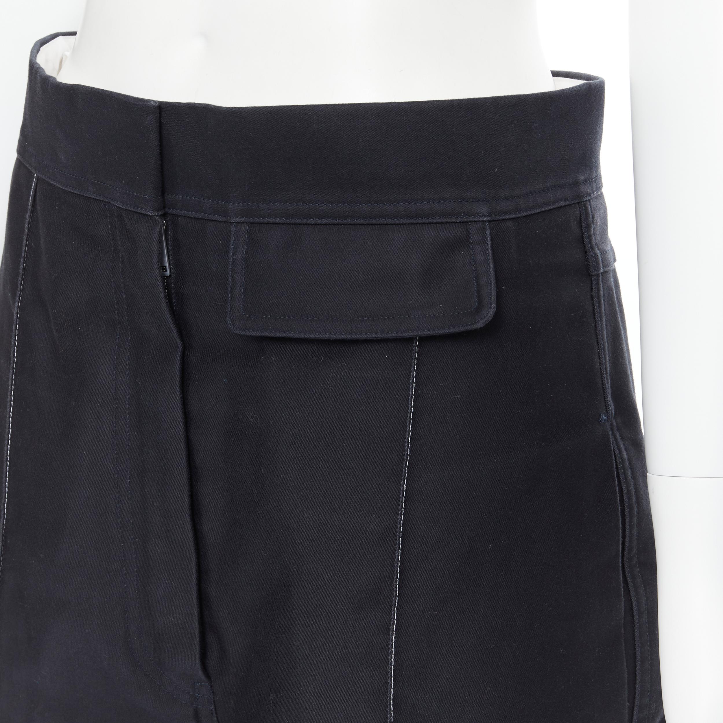 OLD CELINE pantaloni a gamba larga in cotone rigido nero con cuciture a pieghe FR42 
Riferimento: AEMA/A00019 
Marchio: Celine 
Designer: Phoebe Philo 
Materiale: Cotone 
Colore: nero 
Modello: Tinta unita 
Chiusura: zip 
Dettaglio extra: Chiusura