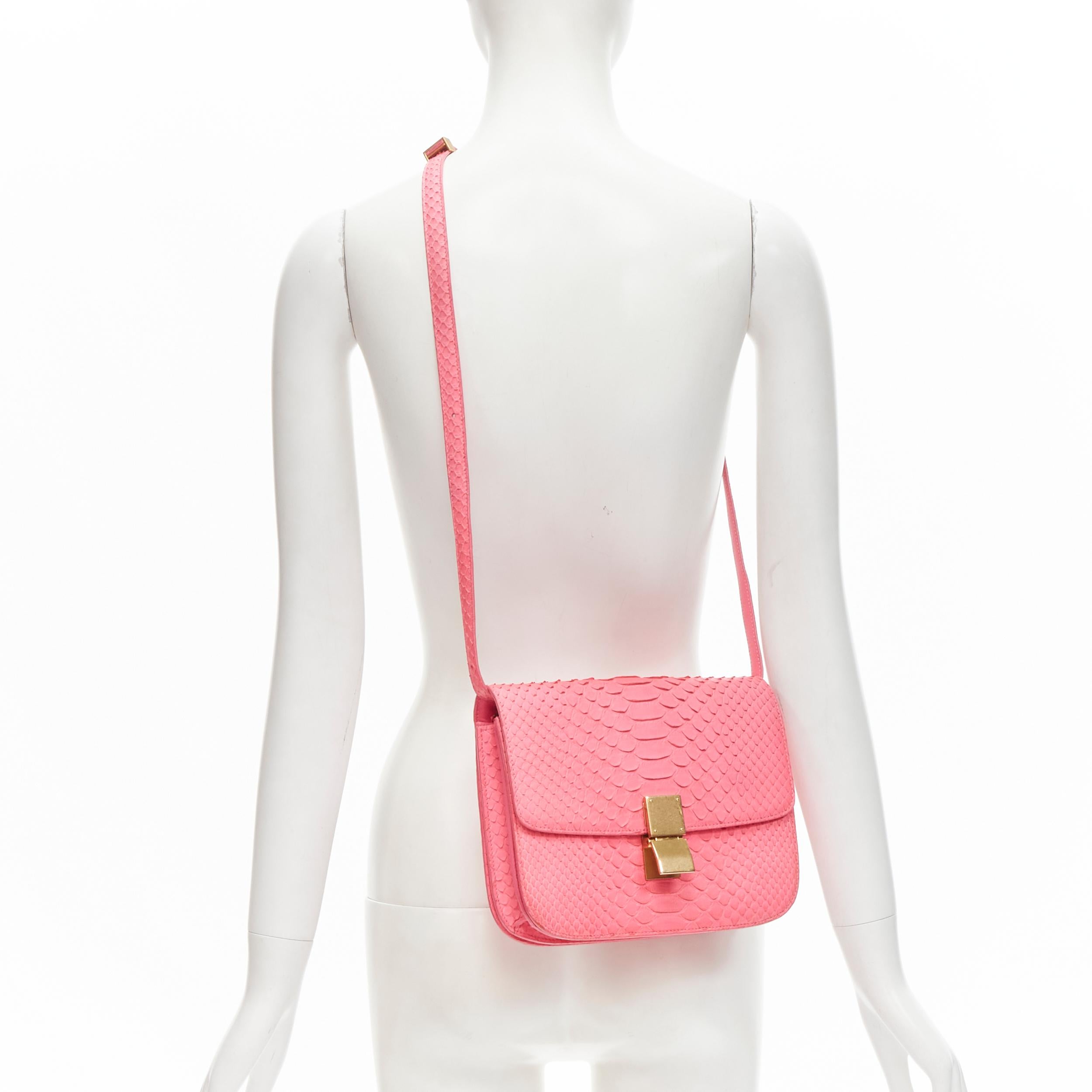 OLD CELINE Medium Classic Box Bag neon pink scaled leather flap crossbody 
Reference: TGAS/C01212 
Brand: Celine 
Designer: Phoebe Philo 
Model: Classic Box Bag 
Material: Leather 
Color: Pink 
Pattern: Solid 
Closure: Clasp 
Extra Detail: Scalred