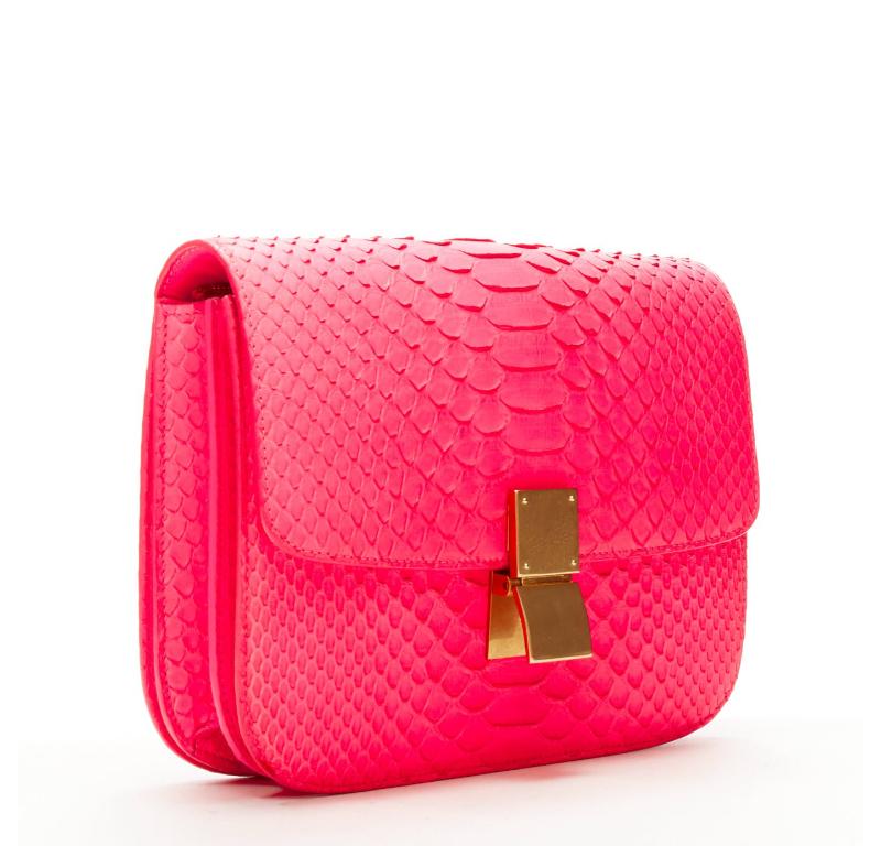 OLD CELINE Medium Classic Box Bag neon pink scaled leather flap crossbody
Reference: TGAS/C01212
Brand: Celine
Designer: Phoebe Philo
Model: Classic Box Bag
Material: Leather
Color: Pink
Pattern: Solid
Closure: Clasp
Lining:  Leather
Extra Details: