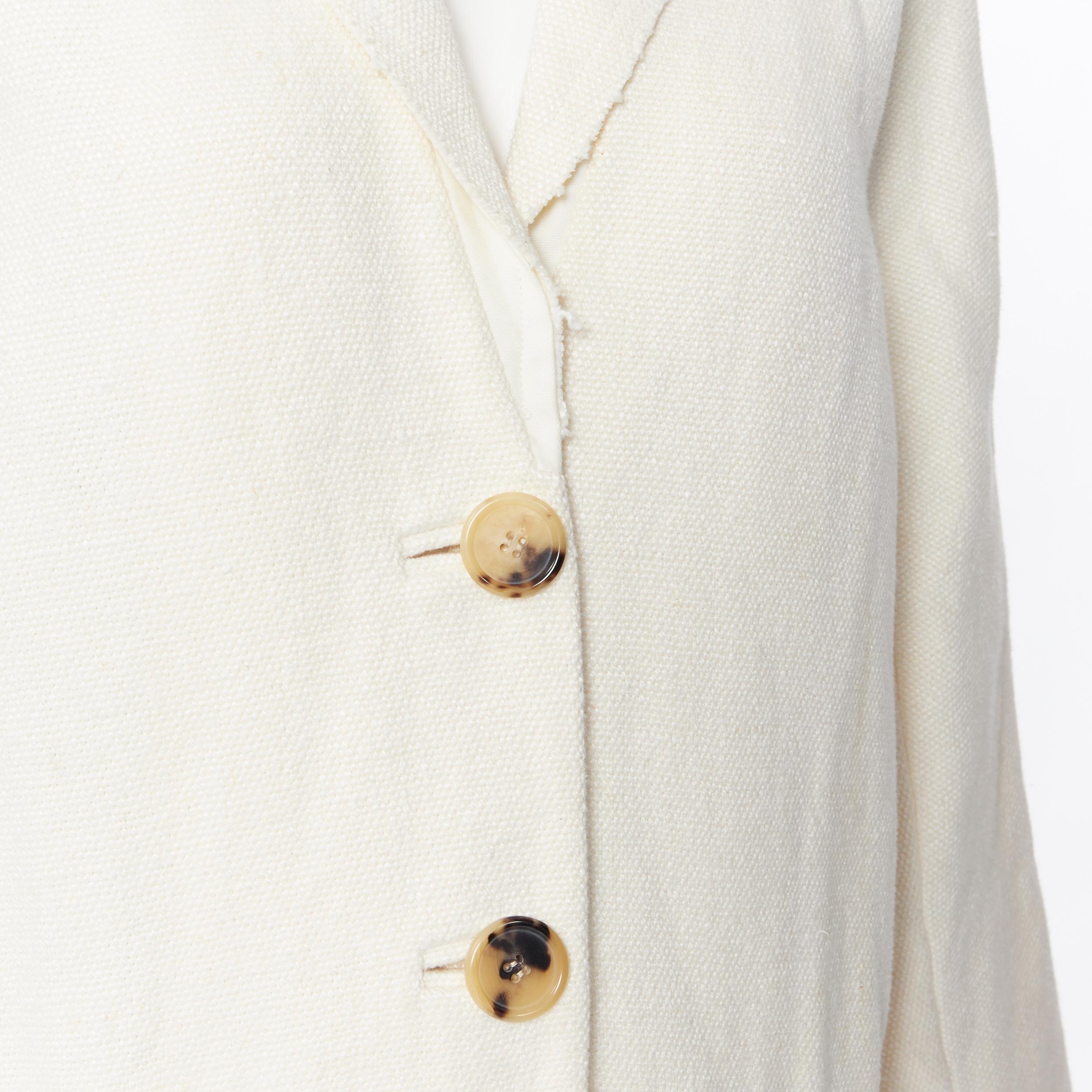OLD CELINE PHOEBE PHILO 100% linen raw frayed hem beige cocoon coat jacket FR34
Brand: Celine
Model Name / Style: Linen coat
Material: Linen
Color: Beige
Pattern: Solid
Closure: Button
Extra Detail: Dual patch front pockets.
Made in: