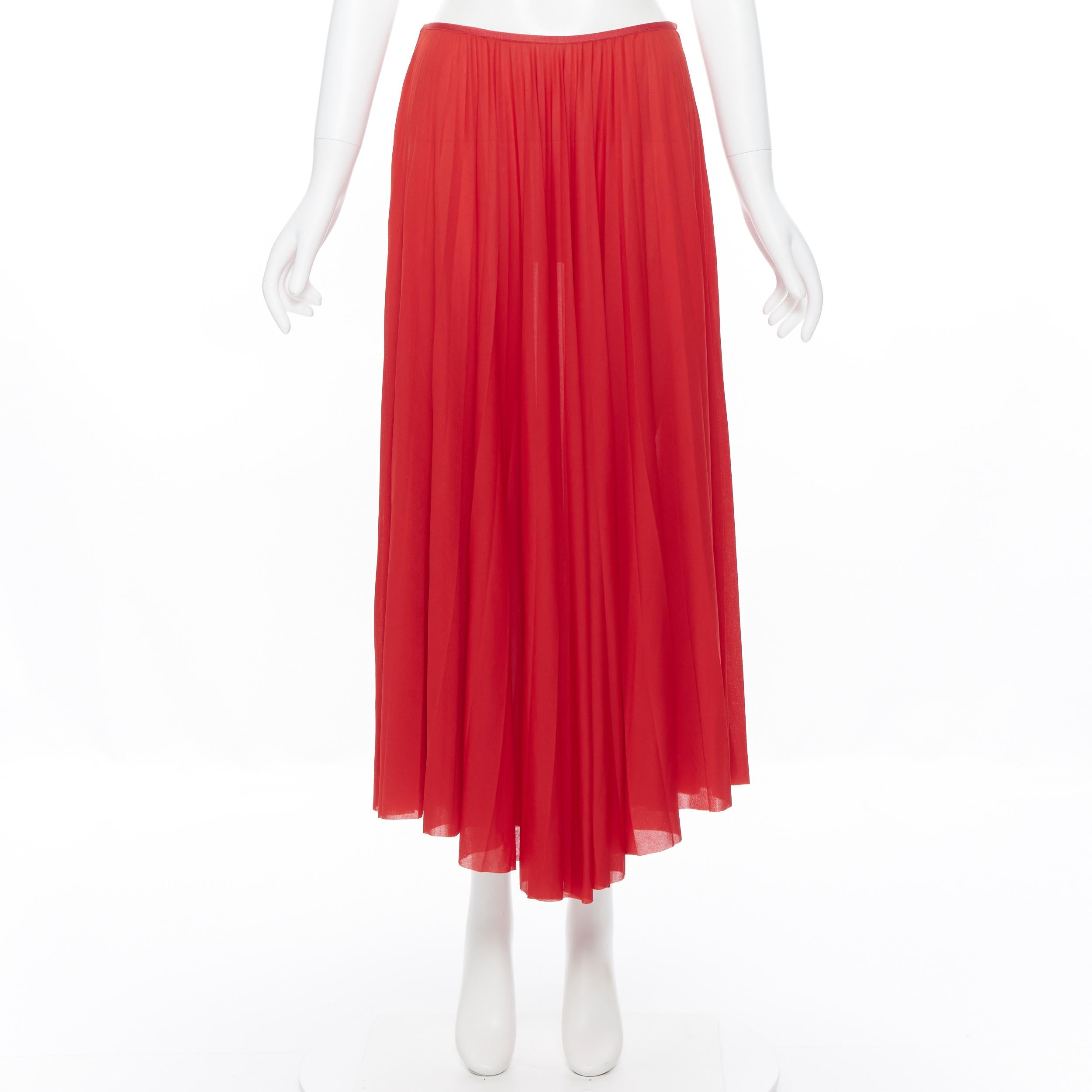 OLD CELINE PHOEBE PHILO 100% polyester poppy red pleated raw cut hem skirt FR36
Brand: Celine
Designer: Phoebe Philo
Model Name / Style: Pleated skirt
Material: Polyester
Color: Red
Pattern: Solid
Closure: Zip
Extra Detail: Stretch fit waist.