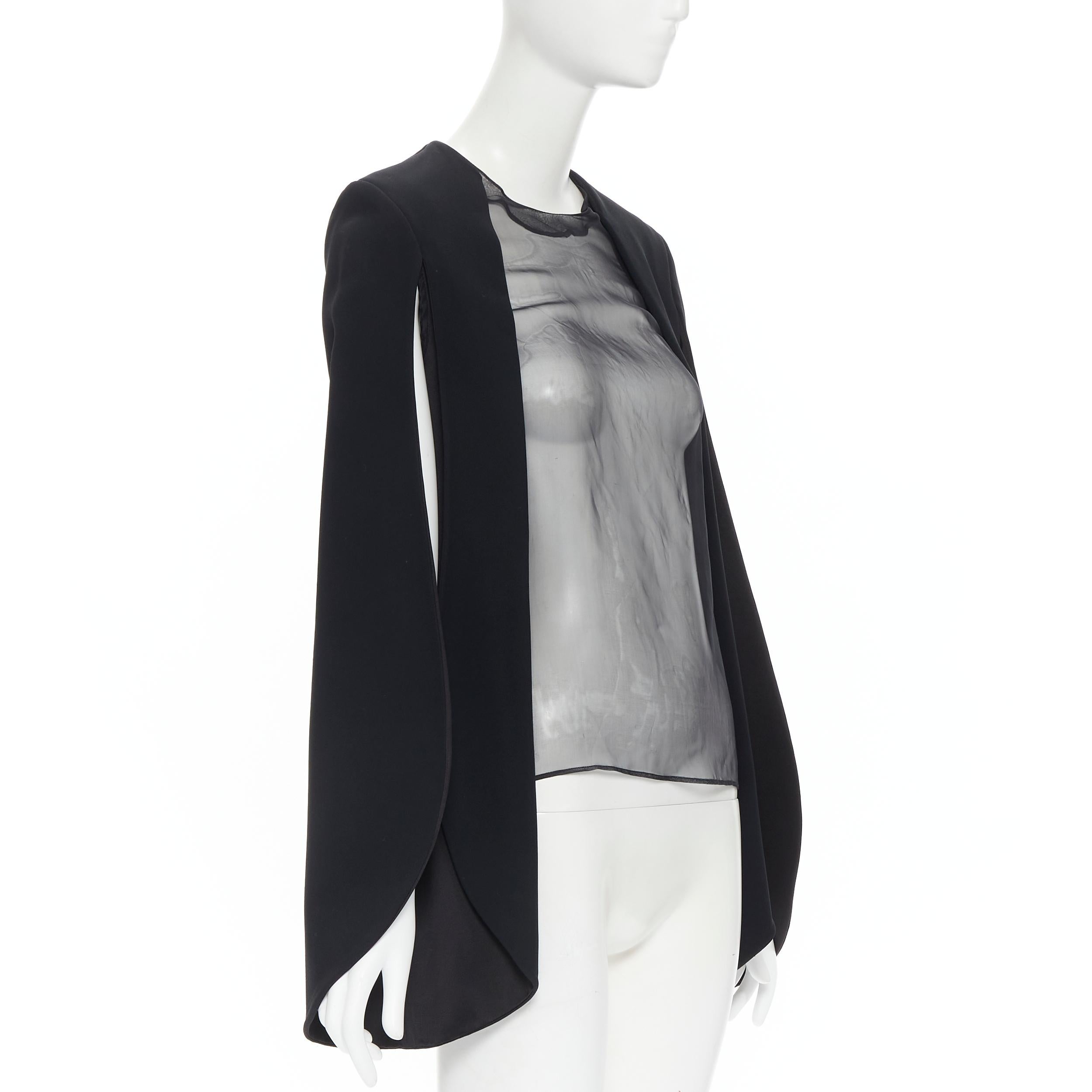 OLD CELINE Phoebe Philo 2011 Runway sheer front round cape sleeve FR36 S 
Reference: TGAS/B00739 
Brand: Celine 
Designer: Phoebe Philo 
As seen on: Spring Summer 2011 
Material: Viscose 
Color: Black 
Pattern: Solid 
Closure: Zip 
Extra Detail: