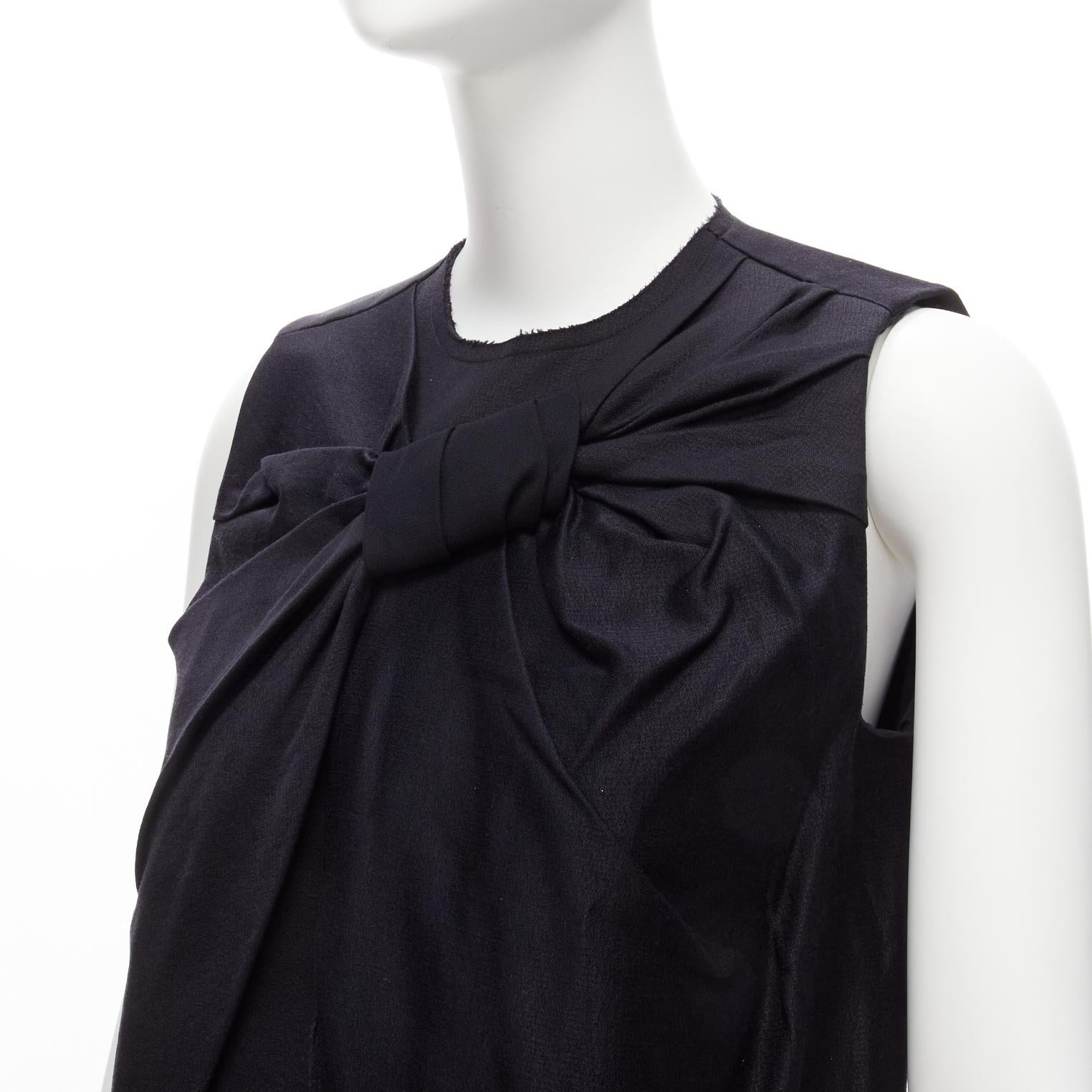 OLD CELINE Phoebe Philo 2013 back gathered bow draped crop top vest FR36 S
Reference: TGAS/D00353
Brand: Celine
Designer: Phoebe Philo
Collection: 2013
As seen on: Spring 2013
Material: Viscose, Silk
Color: Black
Pattern: Solid
Closure: Zip
Lining: