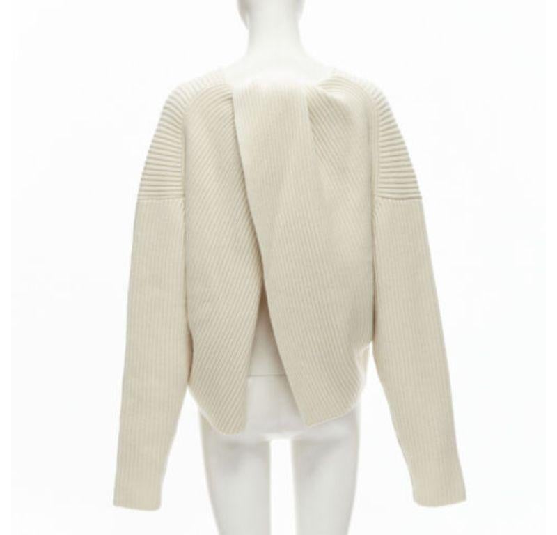 OLD CELINE Phoebe Philo beige wool cashmere twist neck open back sweater S
Reference: TGAS/C01722
Brand: Celine
Designer: Phoebe Philo
Material: Wool, Cashmere
Color: Beige
Pattern: Solid
Closure: Pullover
Extra Details: Twist knot open back design.