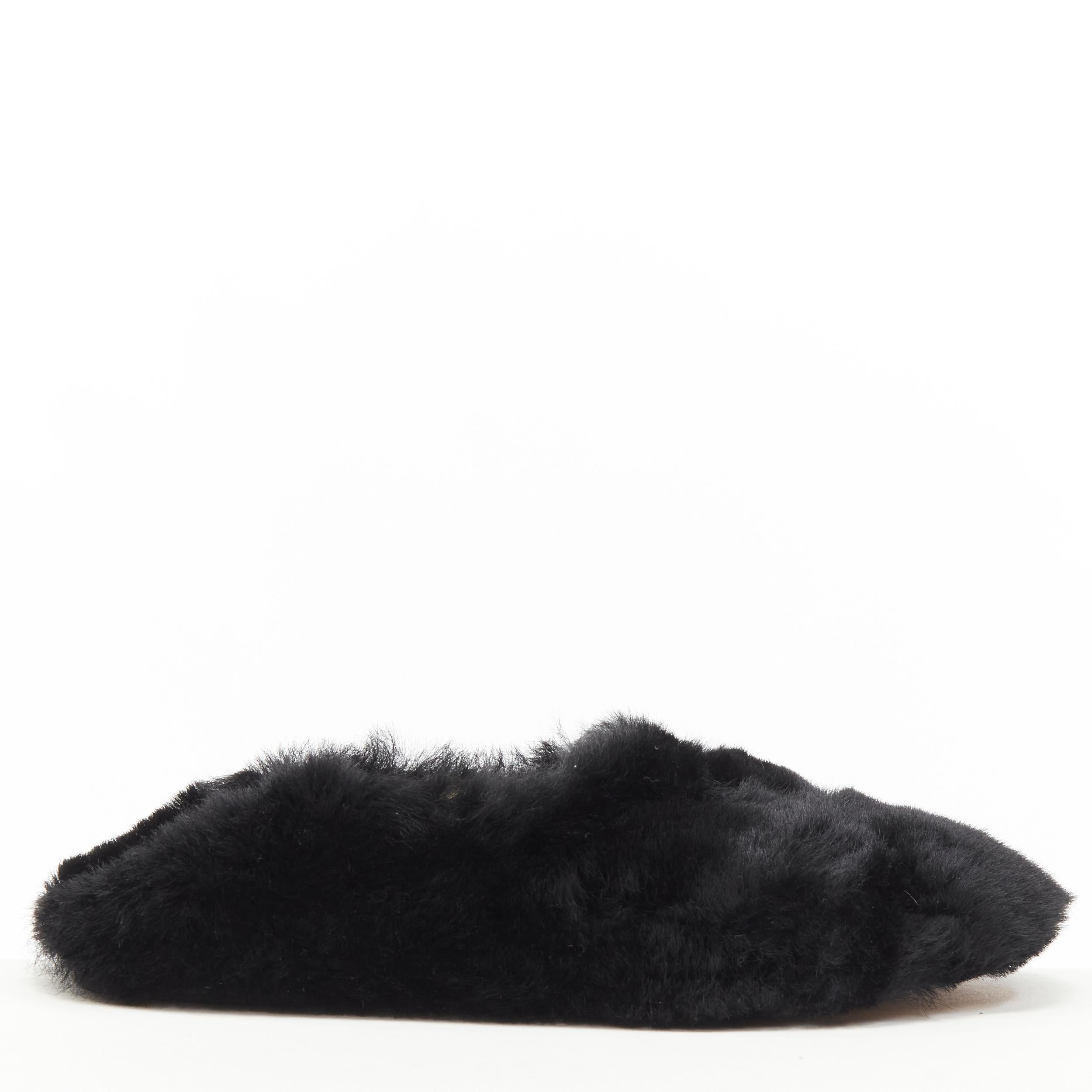 OLD CELINE Phoebe Philo black fluffy fur slip on flats EU37.5 
Reference: LNKO/A01990 
Brand: Celine 
Designer: Phoebe Philo 
Material: Fur 
Color: Black 
Pattern: Solid 
Extra Detail: Option to step on back heel as slip-on option. 
Made in: Italy