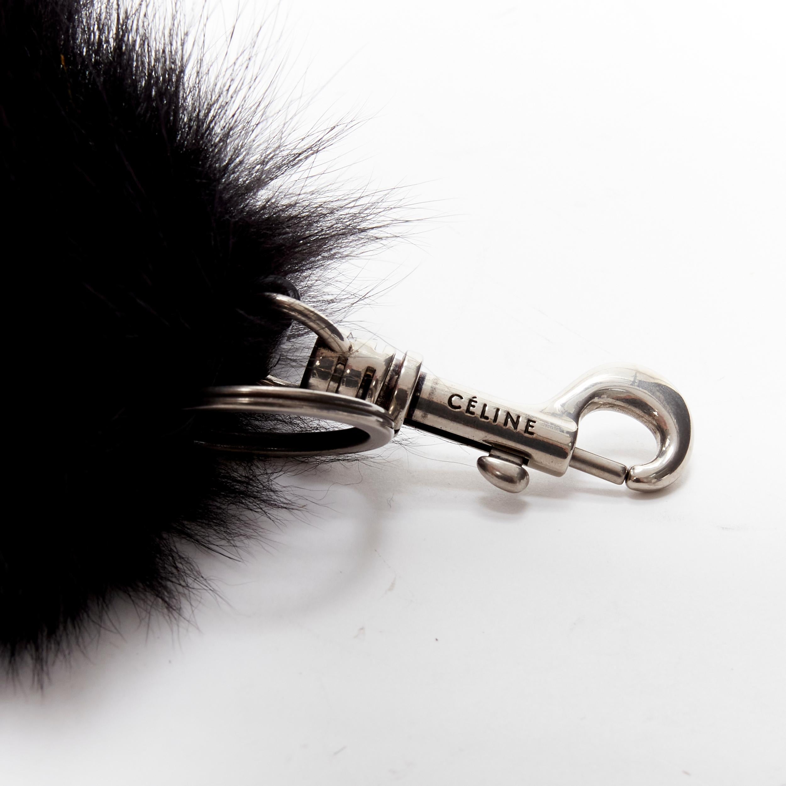 OLD CELINE Phoebe Philo black fox fur tail clasp silver tone keyring bag charm
Reference: LNKO/A02077
Brand: Celine
Designer: Phoebe Philo
Material: Fur, Metal
Color: Black
Pattern: Solid
Closure: Clasp

CONDITION:
Condition: Excellent, this item