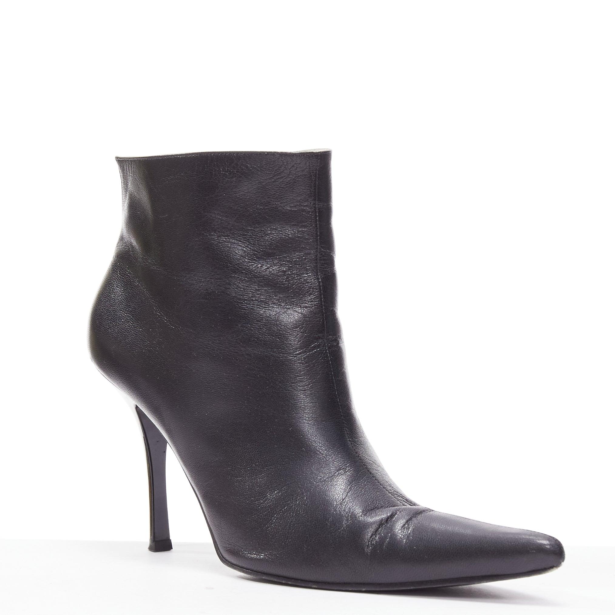 OLD CELINE Phoebe Philo black leather ankle bootie heels EU38.5
Reference: KEDG/A00297
Brand: Celine
Designer: Phoebe Philo
Material: Leather
Color: Black
Pattern: Solid
Closure: Slip On
Lining: White Leather
Extra Details: Stiletto heels.
Made in: