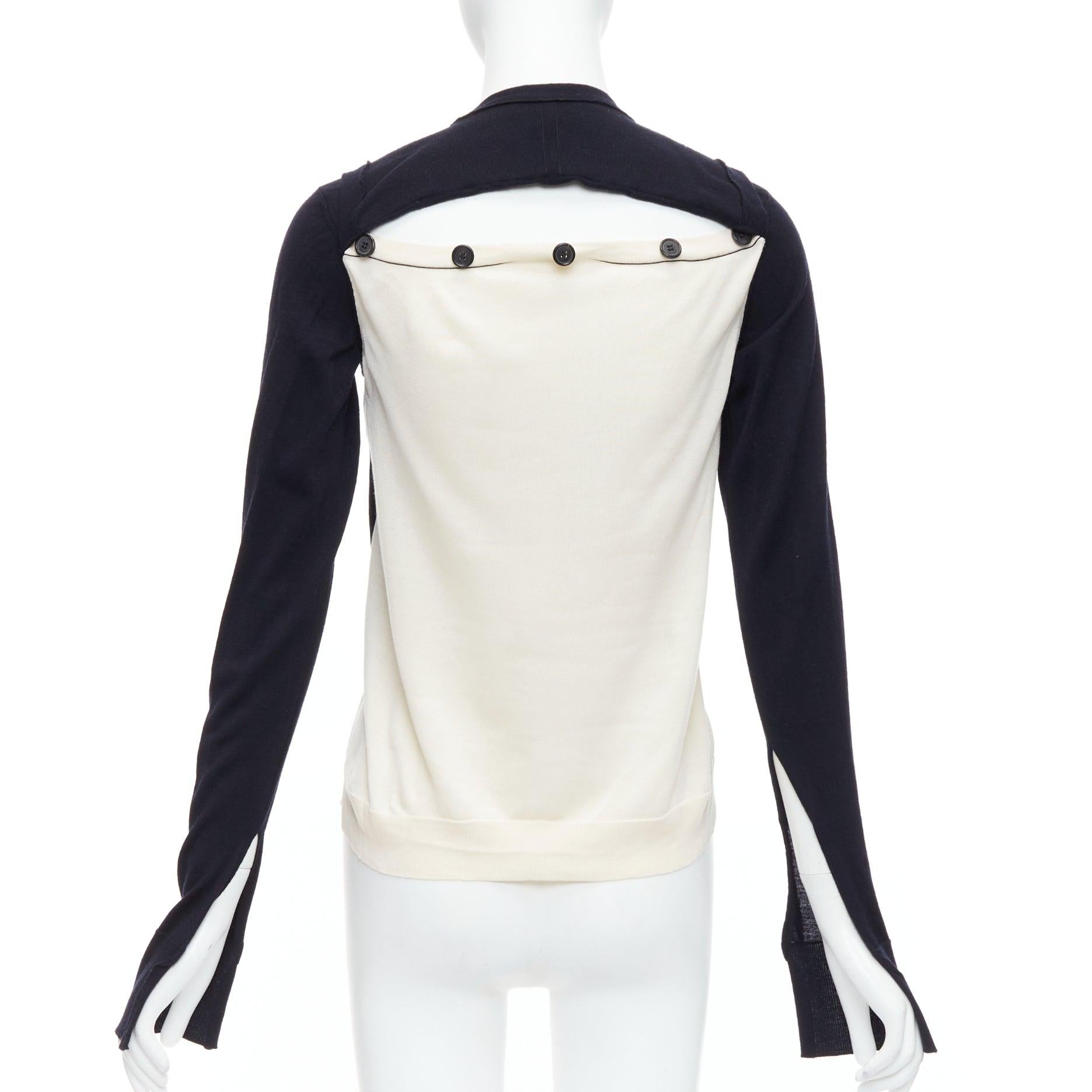 OLD CELINE Phoebe Philo black wool cream silk panelled button detail sweater XS
Reference: YIKK/A00123
Brand: Celine
Designer: Phoebe Philo
Material: Silk, Wool
Color: Black, Cream
Pattern: Solid
Closure: Slip On
Extra Details: Black buttons at