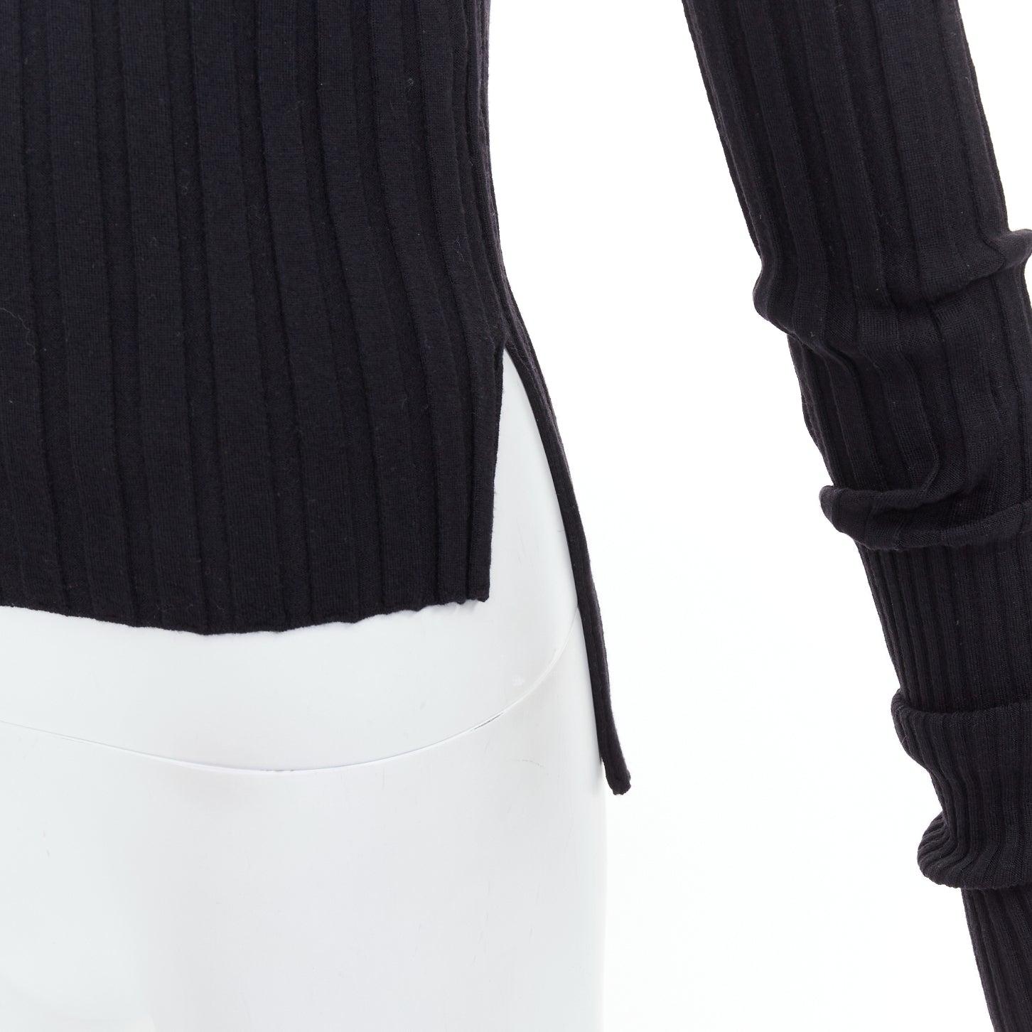 OLD CELINE Phoebe Philo black wool turtleneck ribbed long sleeve top XS
Reference: YIKK/A00205
Brand: Celine
Designer: Phoebe Philo
Material: Wool
Color: Black
Pattern: Solid
Closure: Slip On
Made in: Italy

CONDITION:
Condition: Excellent, this