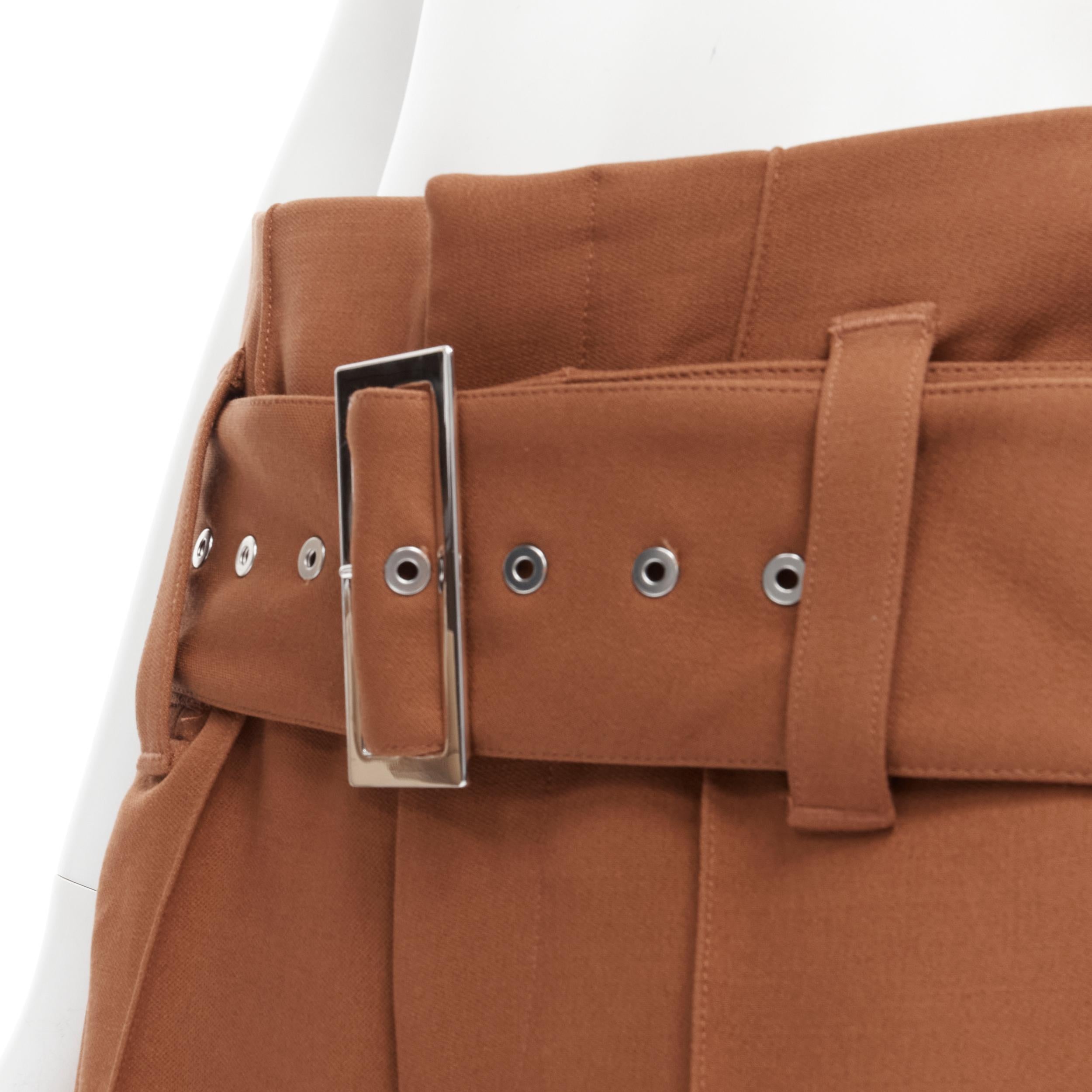 OLD CELINE Phoebe Philo brown belted overstitch wide leg pants FR36 S 
Reference: TGAS/B01881 
Brand: Celine 
Designer: Phoebe Philo 
Material: Wool 
Color: Brown 
Pattern: Solid 
Closure: Zip 
Extra Detail: Silver-tone hardware. Wide buckle. White