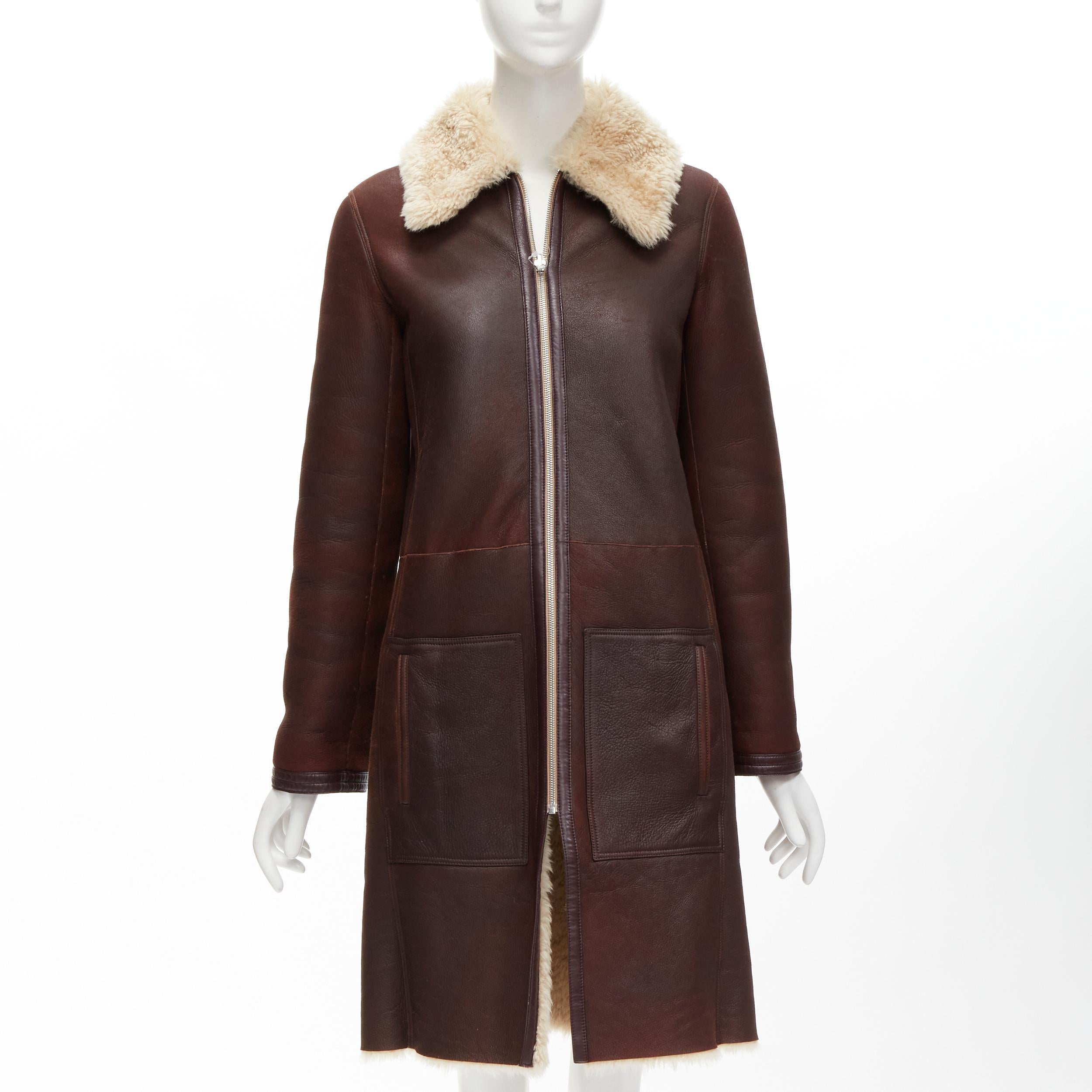 OLD CELINE Phoebe Philo brown lambskin sheep shearling fur reversible coat FR36
Reference: TGAS/C01634
Brand: Celine
Designer: Phoebe Philo
Material: Lambskin Leather
Color: Beige, Brown
Pattern: Solid
Closure: Zip
Lining: Shearling
Extra Details: