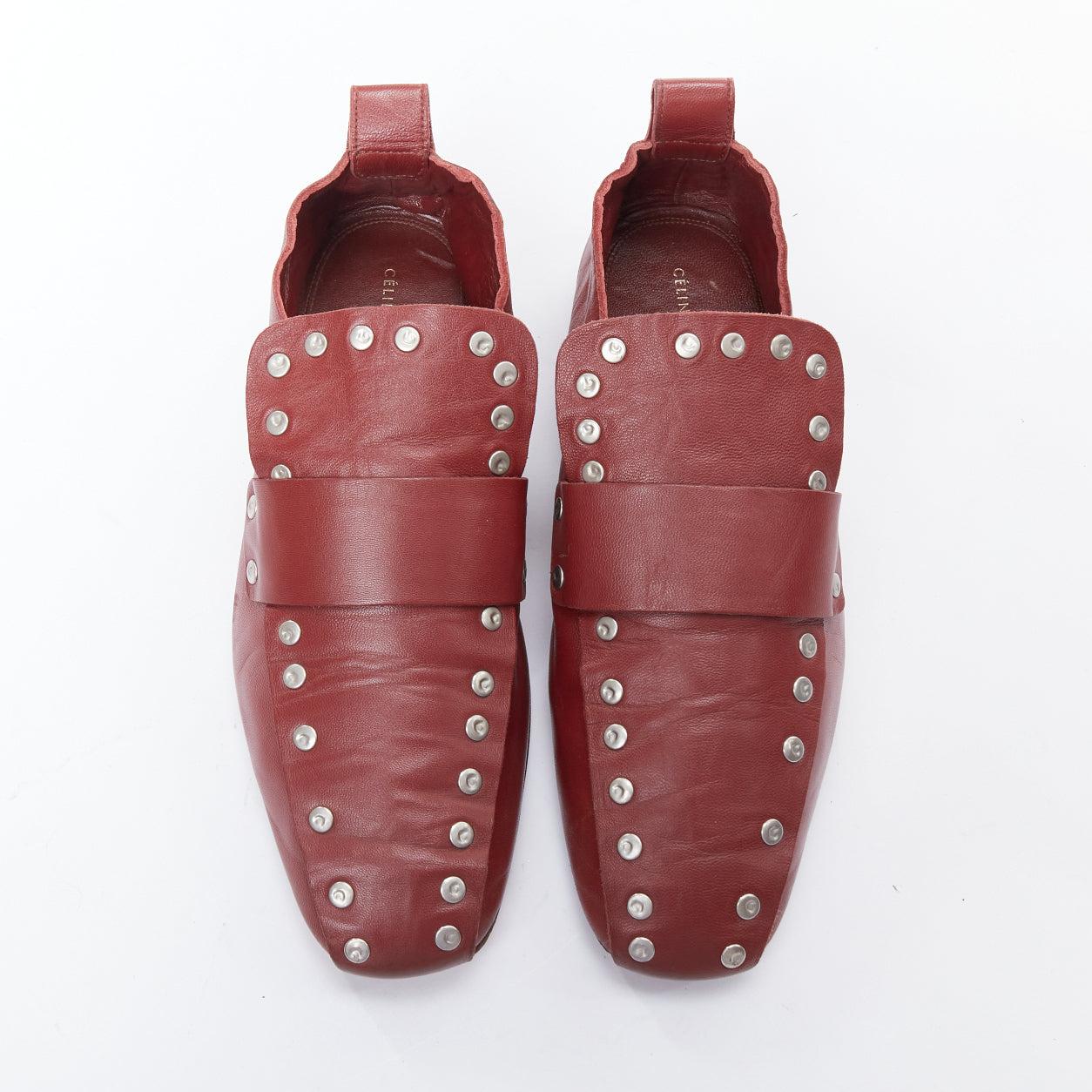 OLD CELINE Phoebe Philo burgundy silver stud loafer flats EU36.5
Reference: JACG/A00189
Brand: Celine
Designer: Phoebe Philo
Material: Leather
Color: Burgundy, Silver
Pattern: Solid
Closure: Slip On
Lining: Burgundy Leather
Made in: