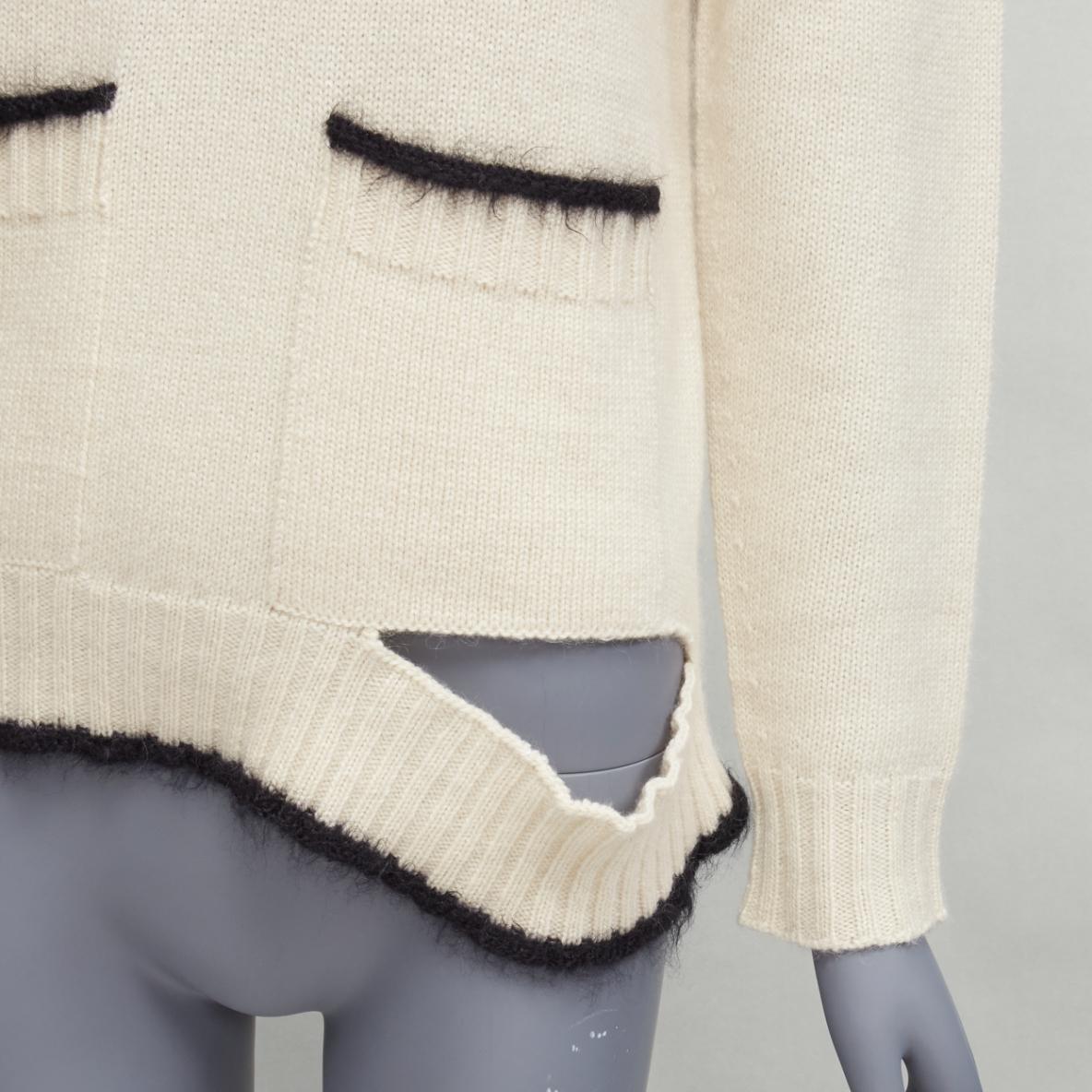 OLD CELINE PHOEBE PHILO cream cashmere mohair cutout turtleneck sweater M
Reference: TGAS/D00387
Brand: Celine
Designer: Phoebe Philo
Material: Cashmere, Mohair
Color: Cream, Black
Pattern: Solid
Closure: Pull On
Made in: