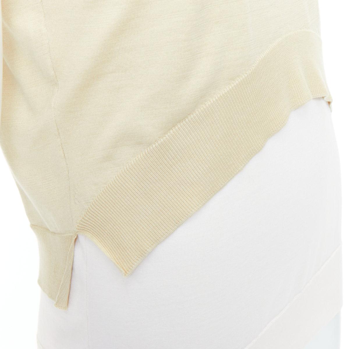 OLD CELINE Phoebe Philo cream silk cotton layered cream knitted top S
Reference: NKLL/A00437
Brand: Celine
Designer: Phoebe Philo
Material: Silk, Cotton
Color: Cream
Pattern: Solid
Closure: Slip On
Made in: Italy

CONDITION:
Condition: Very good,