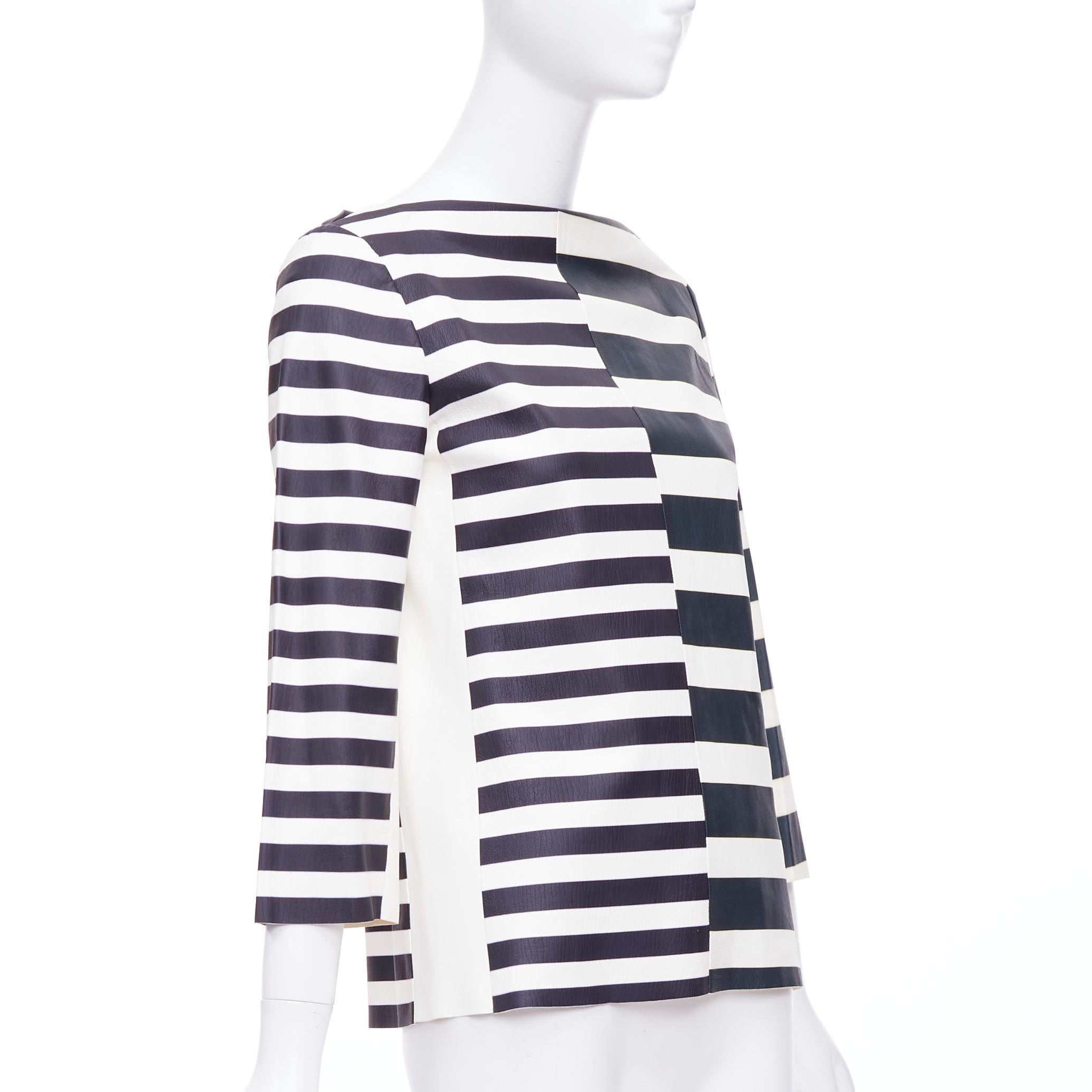 OLD CELINE Phoebe Philo genuine lambskin striped leather patch top FR38 M
Reference: NKLL/A00272
Brand: Celine
Designer: Phoebe Philo
Material: Leather
Color: Black, White
Pattern: Striped
Closure: Zip
Made in: Italy

CONDITION:
Condition: Good,