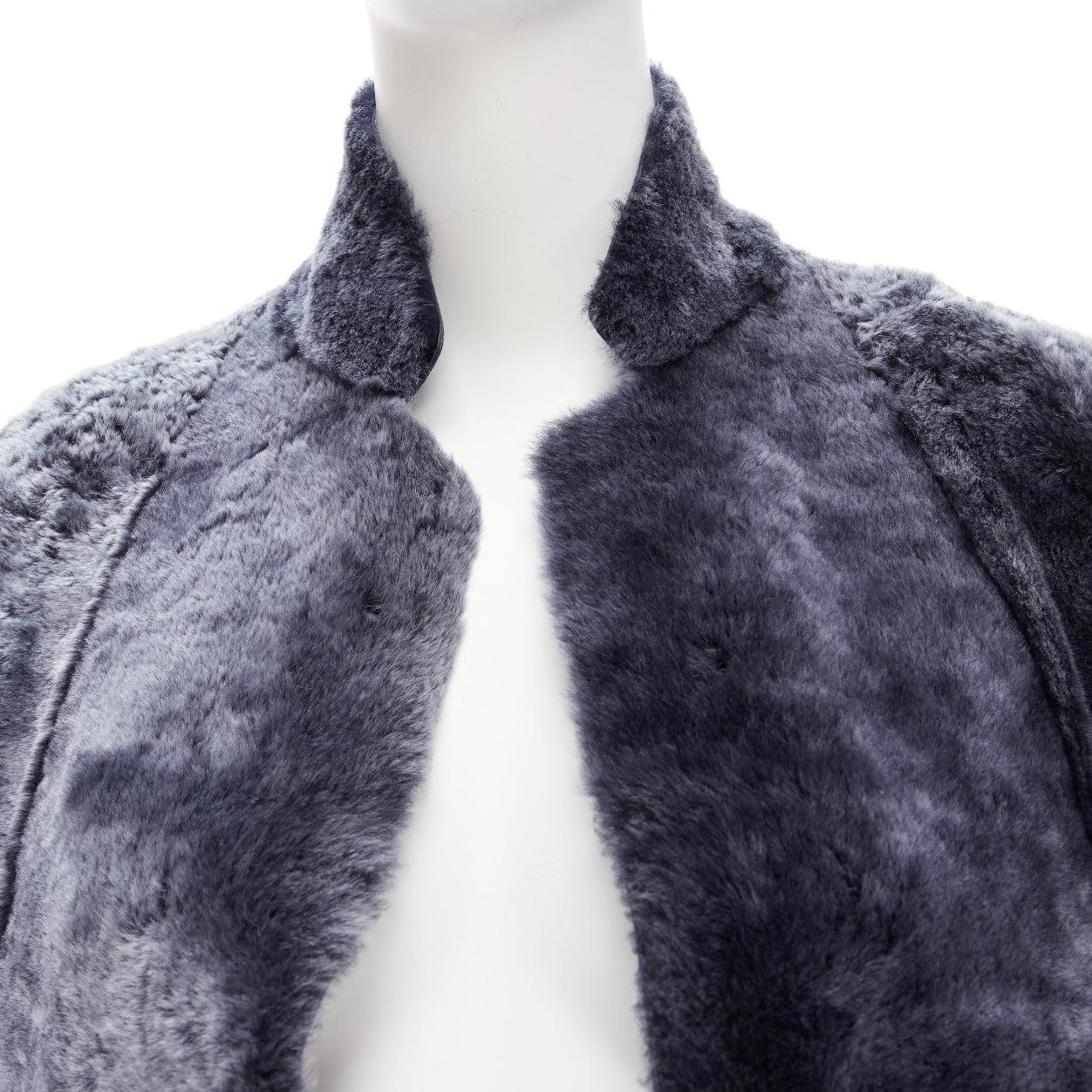 OLD CELINE Phoebe Philo grey lamb fur minimal cocoon coat FR34 XS
Reference: TGAS/D00869
Brand: Celine
Designer: Phoebe Philo
Material: Lambskin Leather
Color: Navy
Pattern: Solid
Lining: Navy Leather
Made in: Italy

CONDITION:
Condition: Excellent,