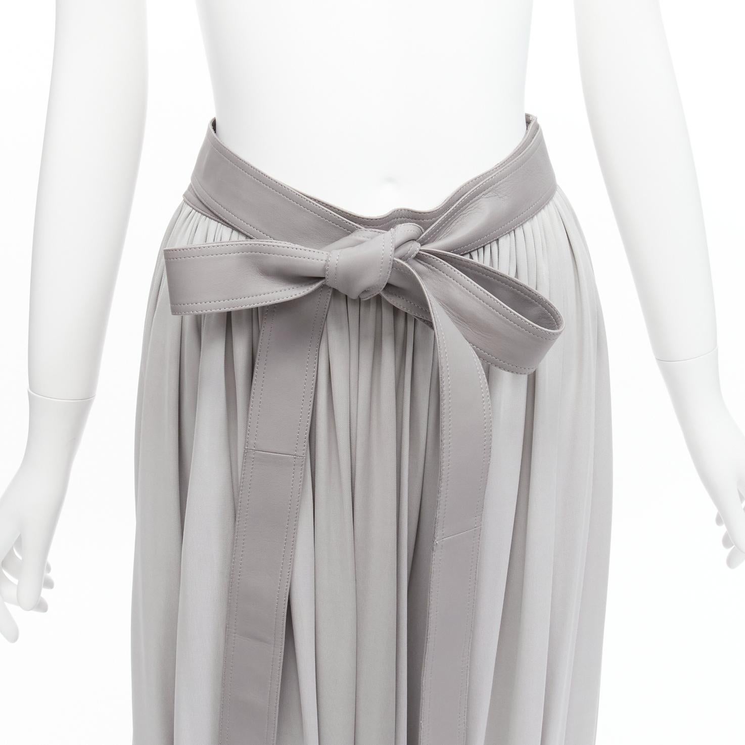 OLD CELINE Phoebe Philo grey lambskin leather tie belt pleated midi skirt FR38 M
Reference: TGAS/D00228
Brand: Celine
Designer: Phoebe Philo
Material: Lambskin Leather, Rayon
Color: Grey
Pattern: Solid
Closure: Wrap Tie
Lining: Grey Fabric
Extra
