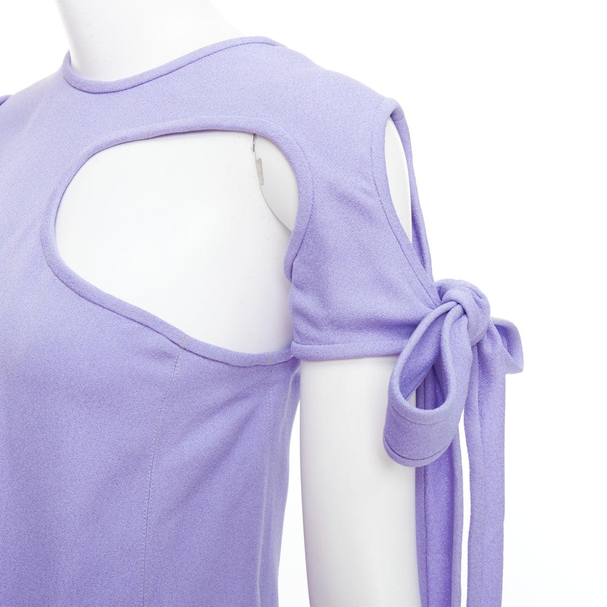 OLD CELINE Phoebe Philo lavender purple tie sleeve cut out top FR38 M
Reference: MECG/A00084
Brand: Celine
Designer: Phoebe Philo
Material: Viscose
Color: Purple
Pattern: Solid
Closure: Self Tie
Made in: France

CONDITION:
Condition: Very good, this
