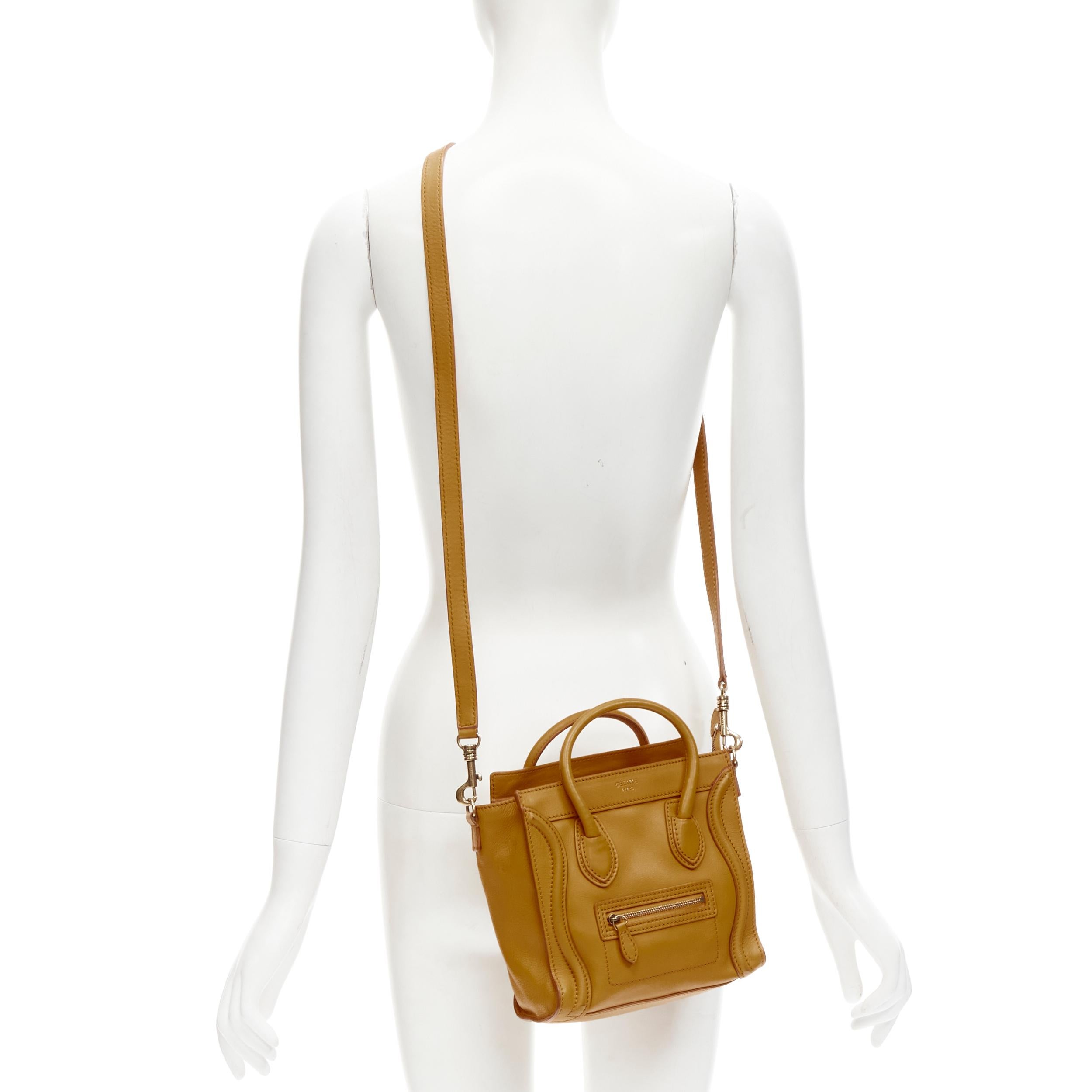 OLD CELINE Phoebe Philo Nano Luggage mustard yellow crossbody shopper tote bag
Brand: Celine
Designer: Phoebe Philo
Model: Nano Luggage
Material: Leather
Color: Yellow
Pattern: Solid
Closure: Zip
Extra Detail: Gold brand foil stamp at front face.