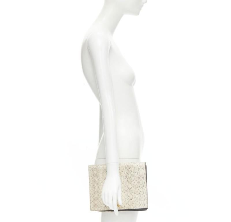 OLD CELINE Phoebe Philo natural scaled leather double flap portfolio clutch bag
Reference: JECN/A00024
Brand: Celine
Designer: Phoebe Philo
Model: Double Flap clutch
Material: Leather
Color: Grey, Black
Pattern: Solid
Closure: Button
Lining: 