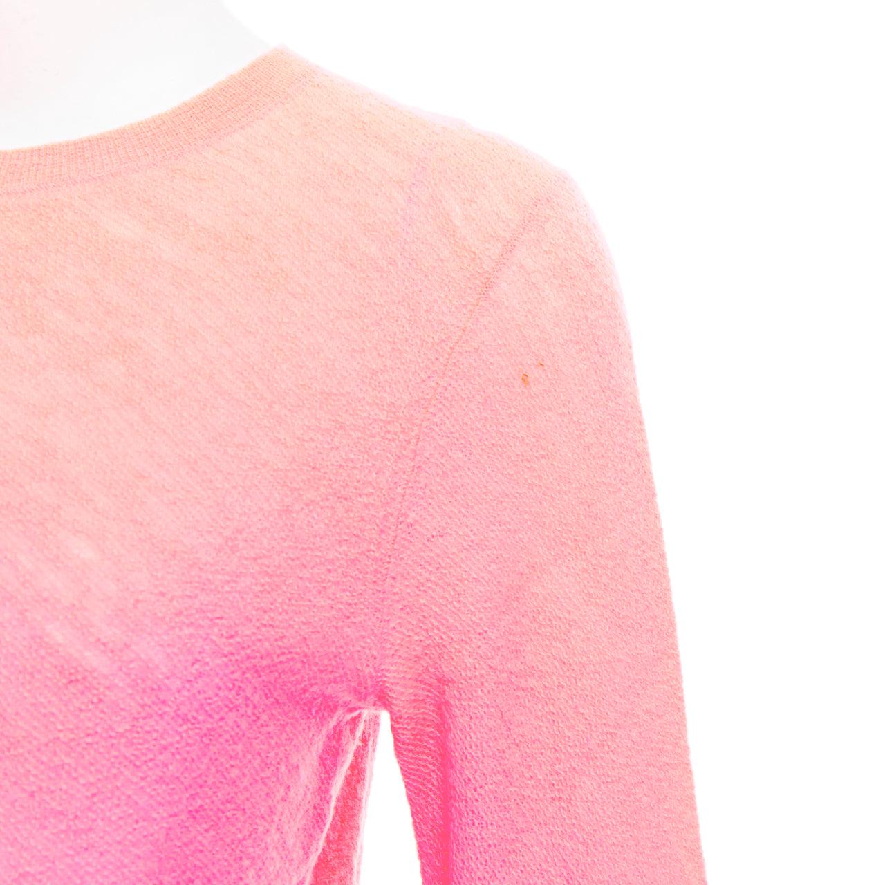 OLD CELINE Phoebe Philo neon coral pink wool knitted sweater S
Reference: GEGG/A00051
Brand: Celine
Designer: Phoebe Philo
Material: Wool
Color: Pink
Pattern: Solid
Closure: Pullover
Extra Details: Small slits details at cuffs.
Made in: