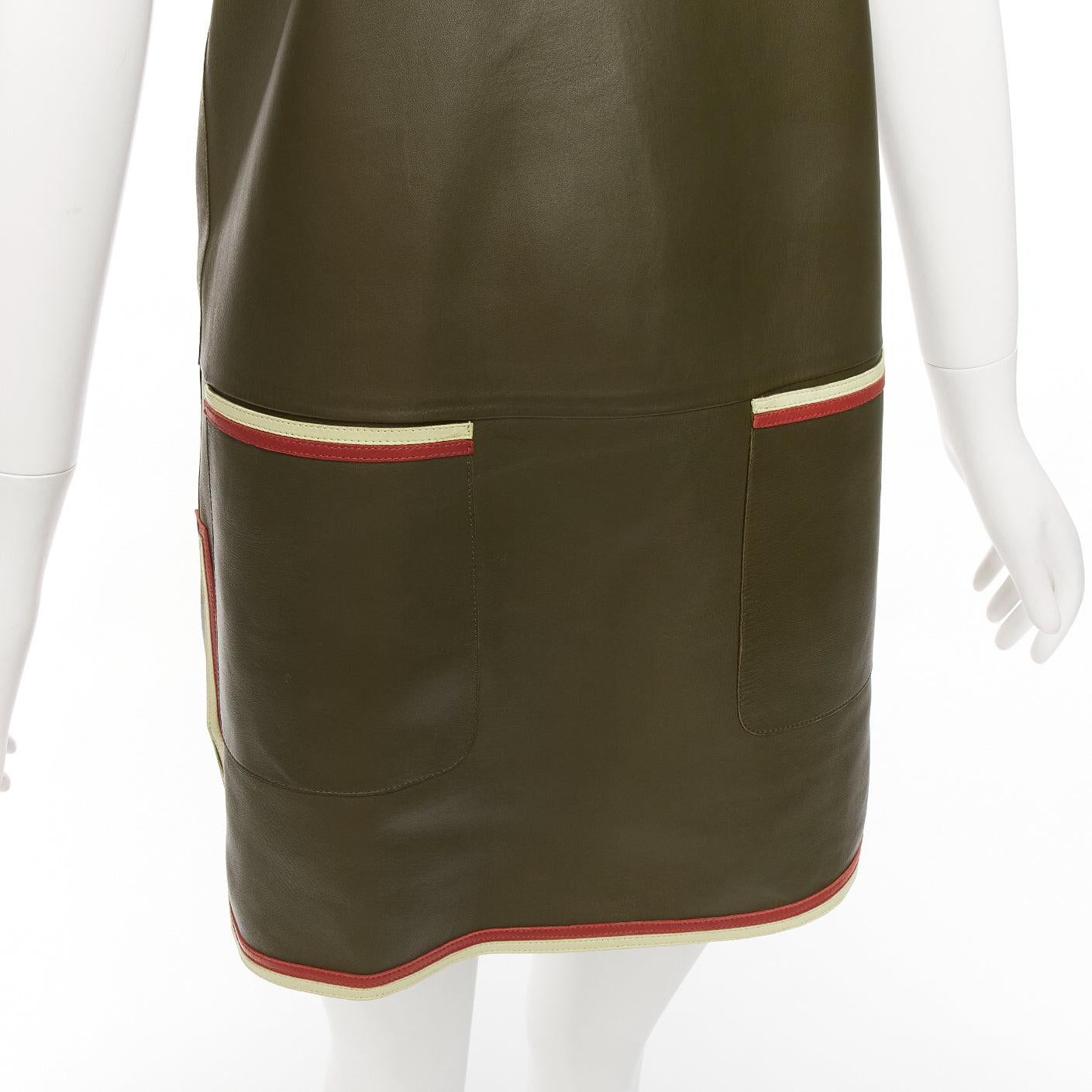 OLD CELINE Phoebe Philo olive green leather red cream trim mod dress FR38 M
Reference: NILI/A00031
Brand: Celine
Designer: Phoebe Philo
Material: Leather
Color: Green, Red
Pattern: Solid
Closure: Zip
Extra Details: Back zip. Panelled bottom.
Made