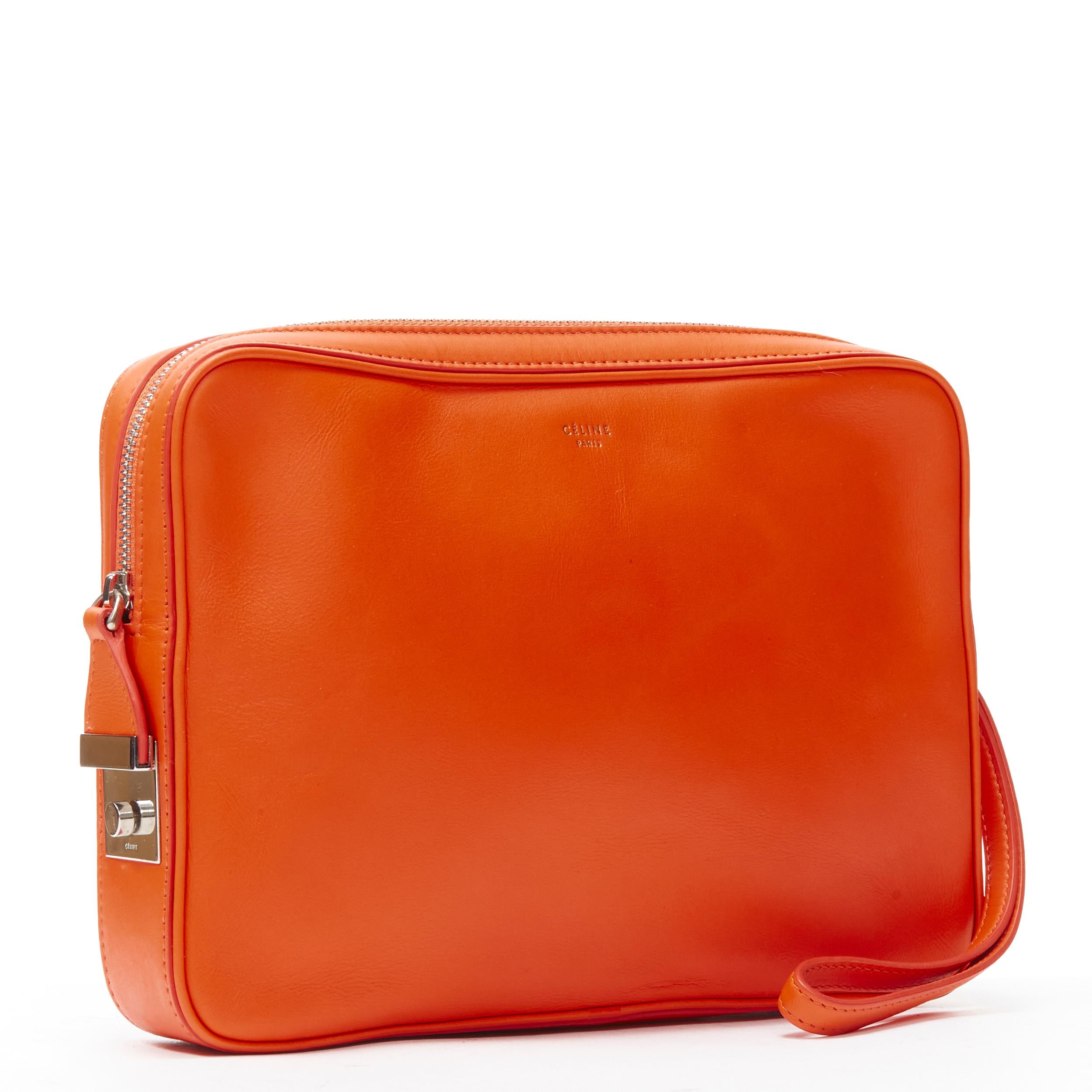 Orange OLD CELINE Phoebe Philo orange leather silver lock Dragonne leather pouch clutch