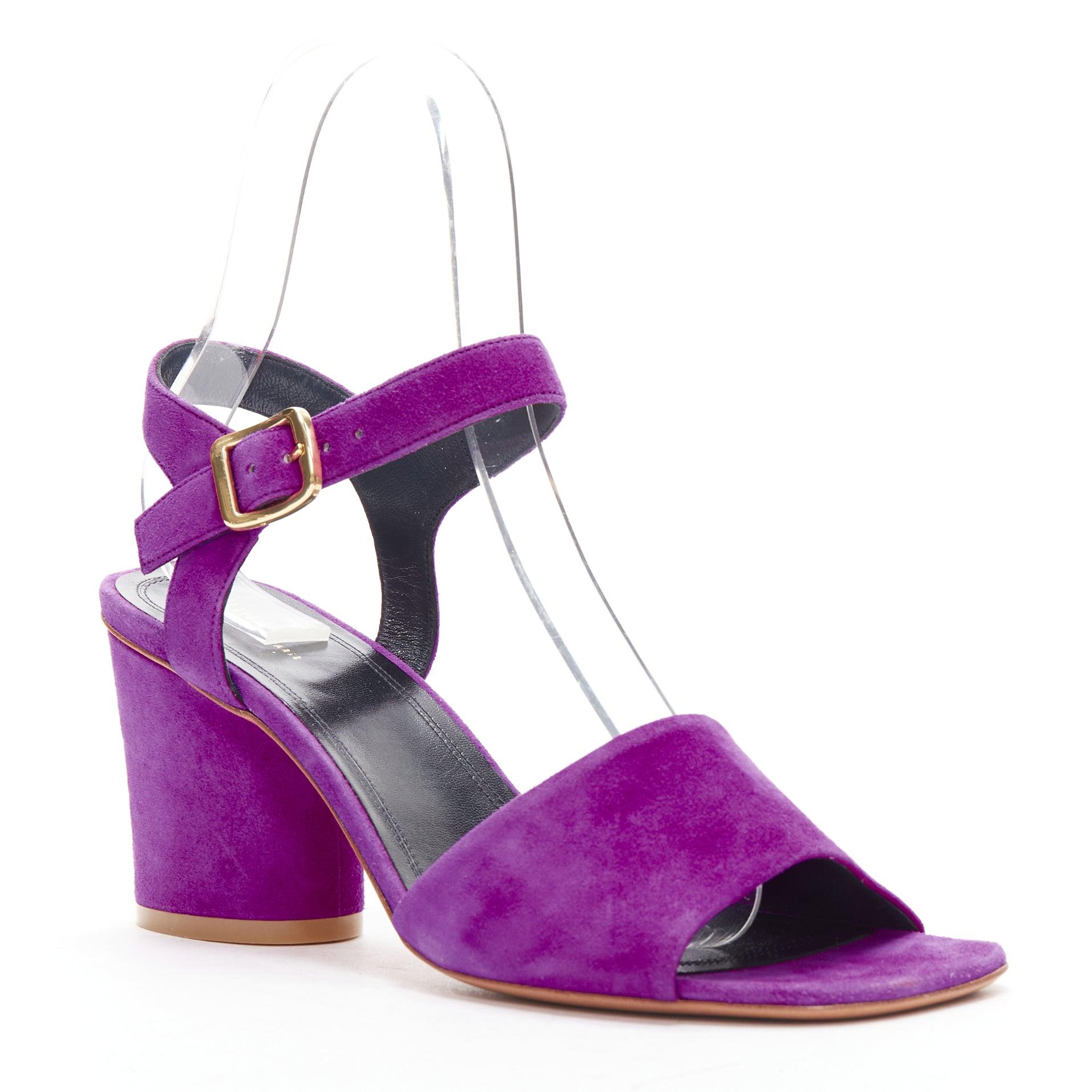 OLD CELINE Phoebe Philo purple suede gold buckle strappy sandal heels EU38
Reference: BSHW/A00158
Brand: Celine
Designer: Phoebe Philo
Material: Suede
Color: Purple, Gold
Pattern: Solid
Closure: Ankle Strap
Lining: Black Leather
Made in: