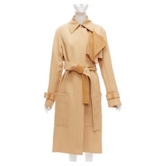 Ancien modèle CELINE : trench-coat déstructuré en laine et cuir de chèvre, couleur beige, signé Phoebe Philo, taille FR38, M