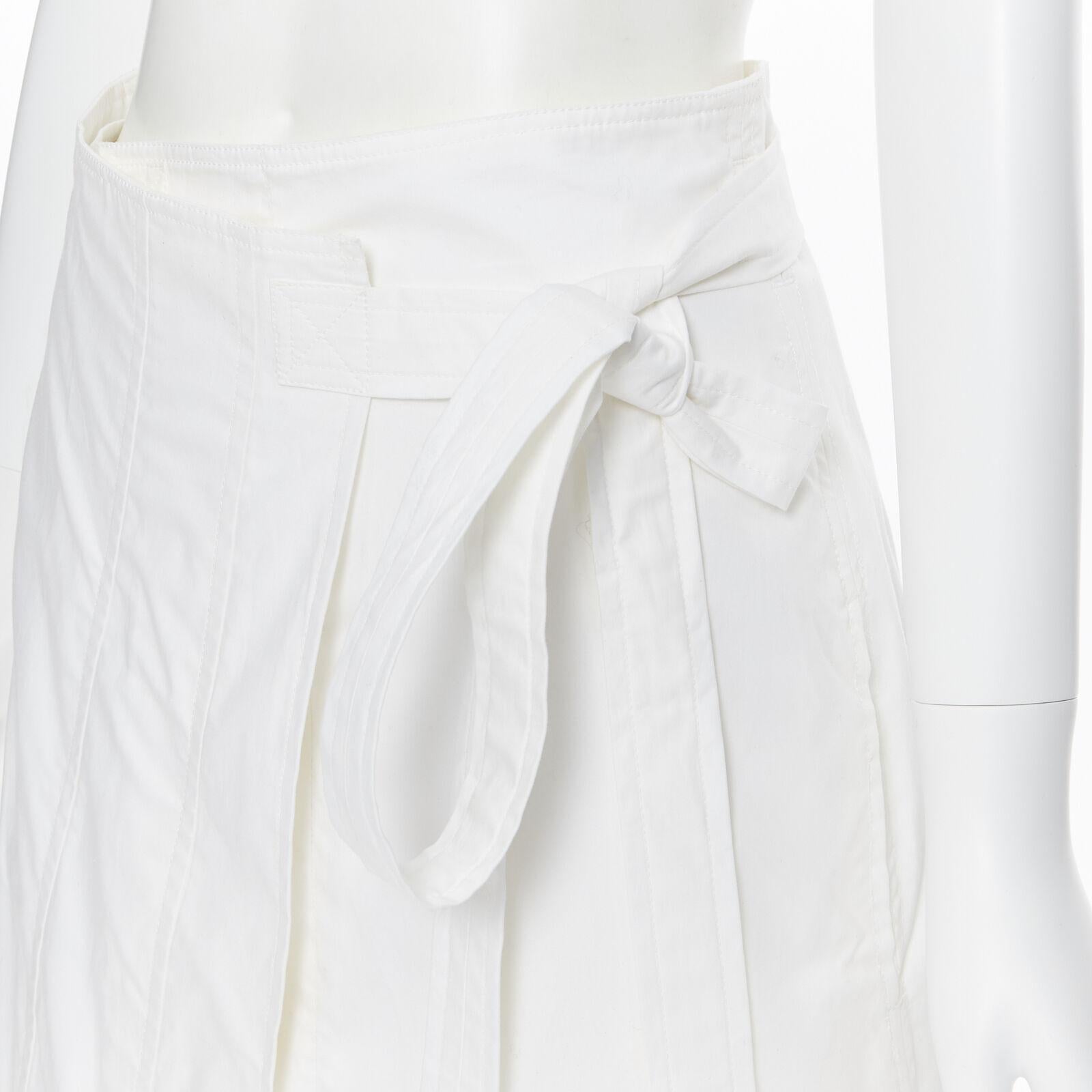 OLD CELINE Phoebe Philo white cotton wrap self tie darted midi skirt XS
Reference: SNKO/A00153
Brand: Celine
Designer: Phoebe Philo
Material: Others
Color: White
Pattern: Solid
Closure: Self Tie
Extra Details: Self tie belted waist. Darted hem. Wrap