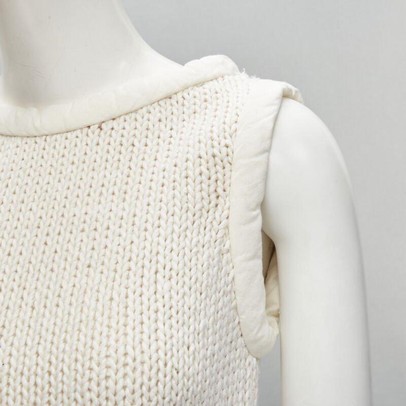 OLD CELINE Phoebe Philo white hand knit padded trim tunic vest XS
Reference: TGAS/B01873
Brand: Celine
Designer: Phoebe Philo
Material: Cotton
Color: White
Pattern: Solid
Extra Details: Padded tubular trimming at neckline and sleeve. Slit side at