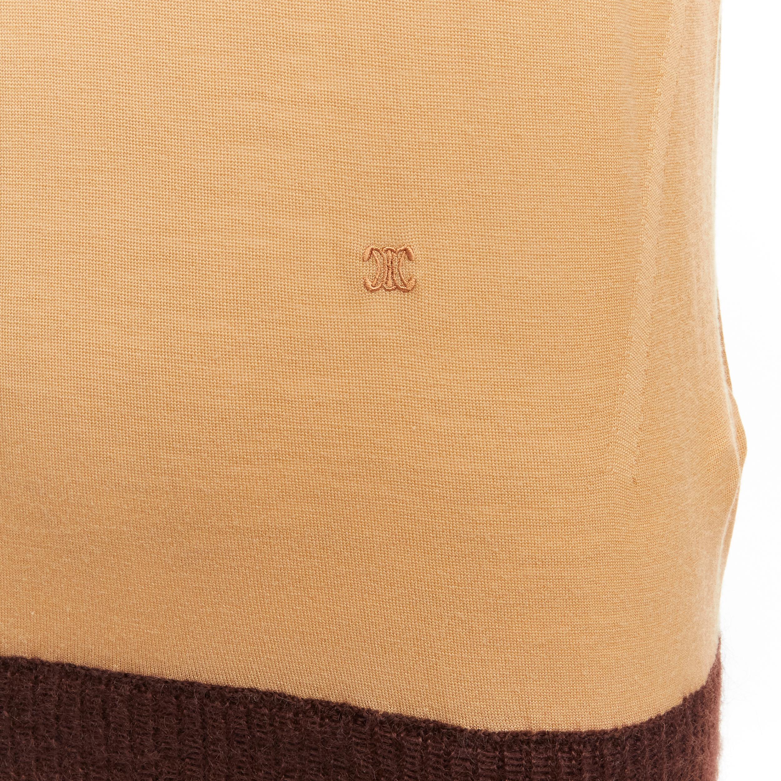 OLD CELINE Phoebe Philo 100% wool mohair blend Triomphe logo contrast cuff sweater XS
Reference: LNKO/A02125
Brand: Celine
Designer: Phoebe Philo
Material: Wool, Mohair, Blend
Color: Beige, Yellow
Pattern: Solid
Closure: Pullover
Extra Details: