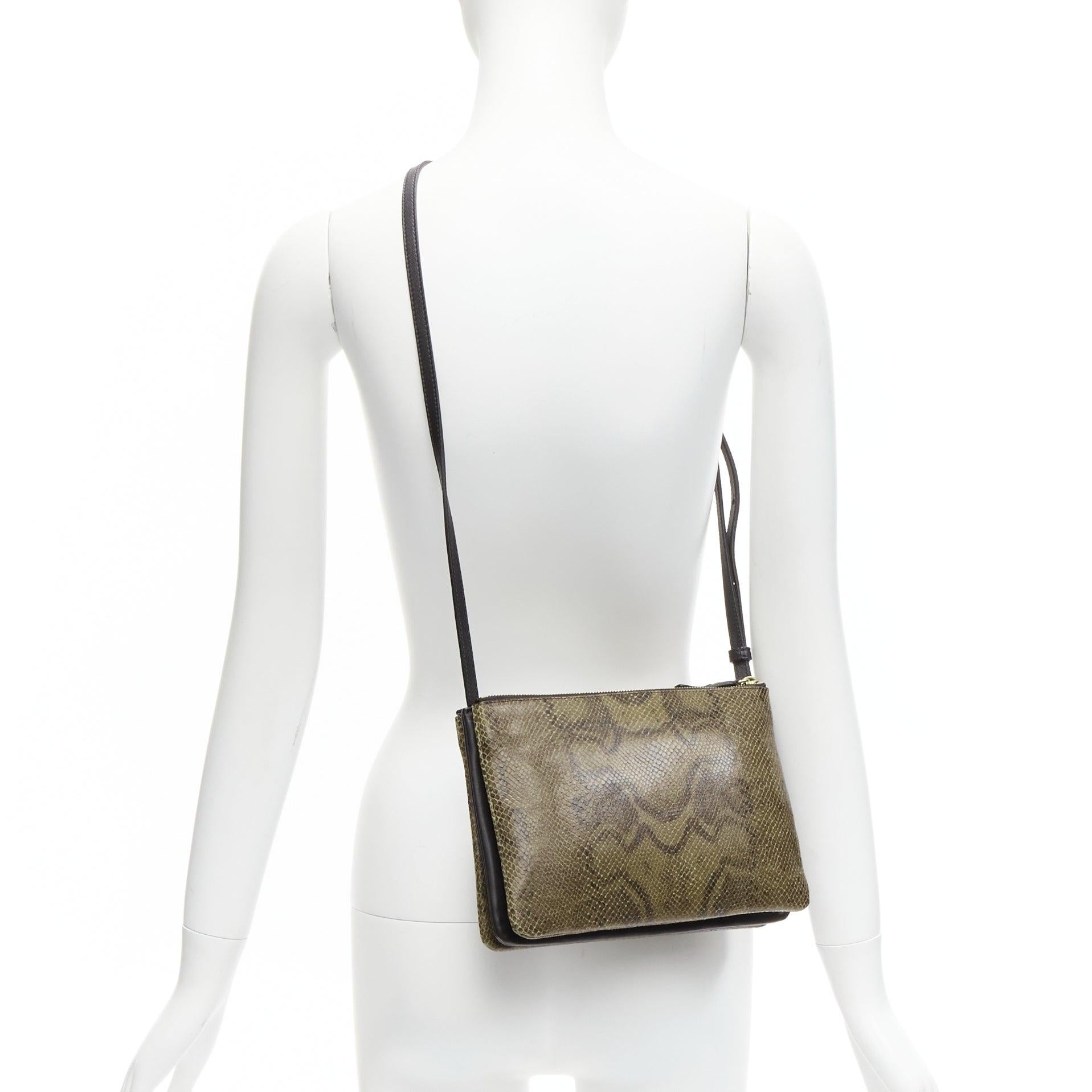 OLD CELINE Small Trio brown scaled leather detachable shoulder pouch bag
Reference: TGAS/D00684
Brand: Celine
Designer: Phoebe Philo
Model: Trio Small
Material: Faux Leather
Color: Brown, Black
Pattern: Animal Print
Closure: Zip
Lining: Black