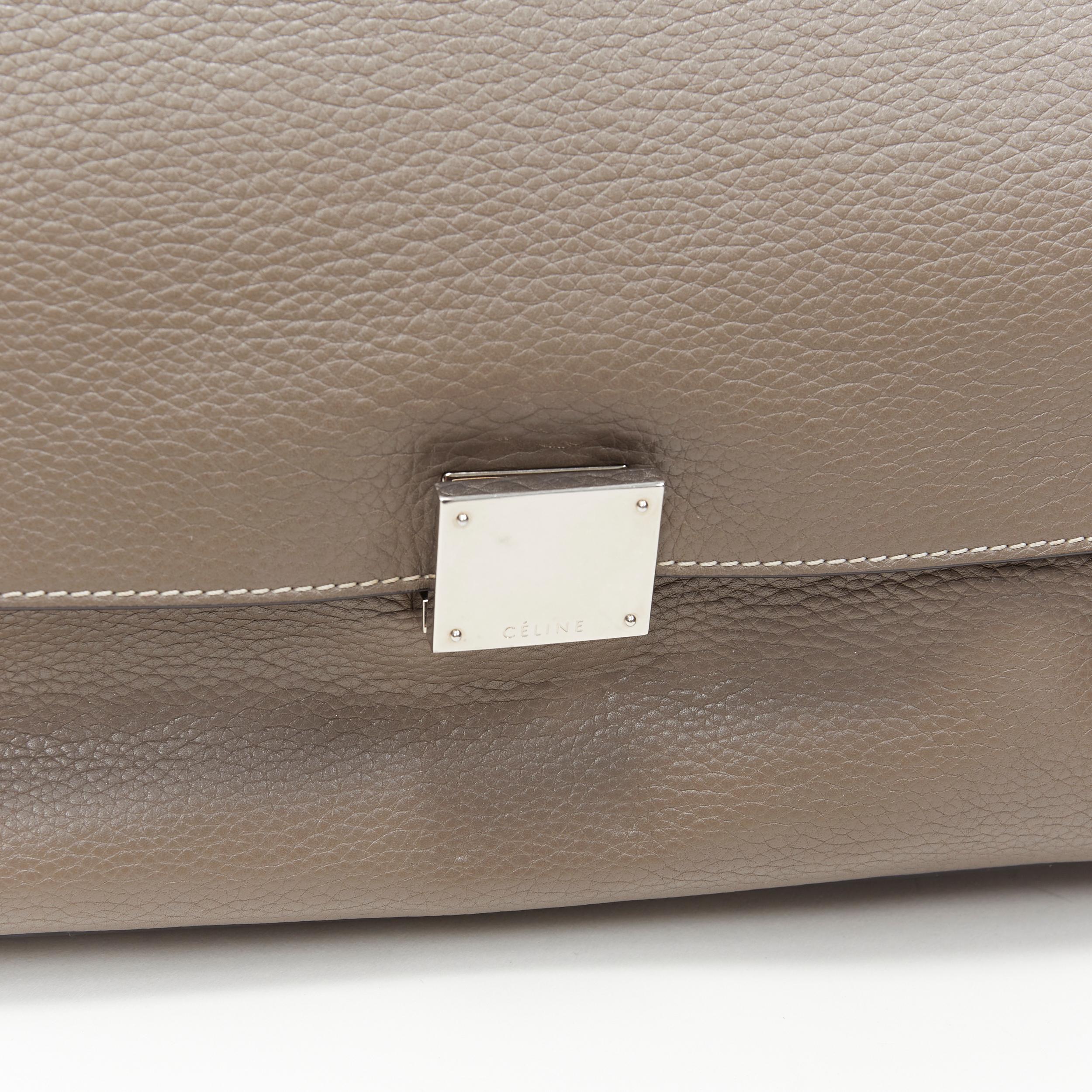 OLD CELINE Trapeze grey leather suede flap top handle flap satchel shoulder bag
Reference: CAKK/A00012
Brand: Celine
Designer: Phoebe Philo
Model: Trapeze bag
Material: Leather, Suede
Color: Brown
Pattern: Solid
Closure: Clasp
Lining:  Leather
Extra