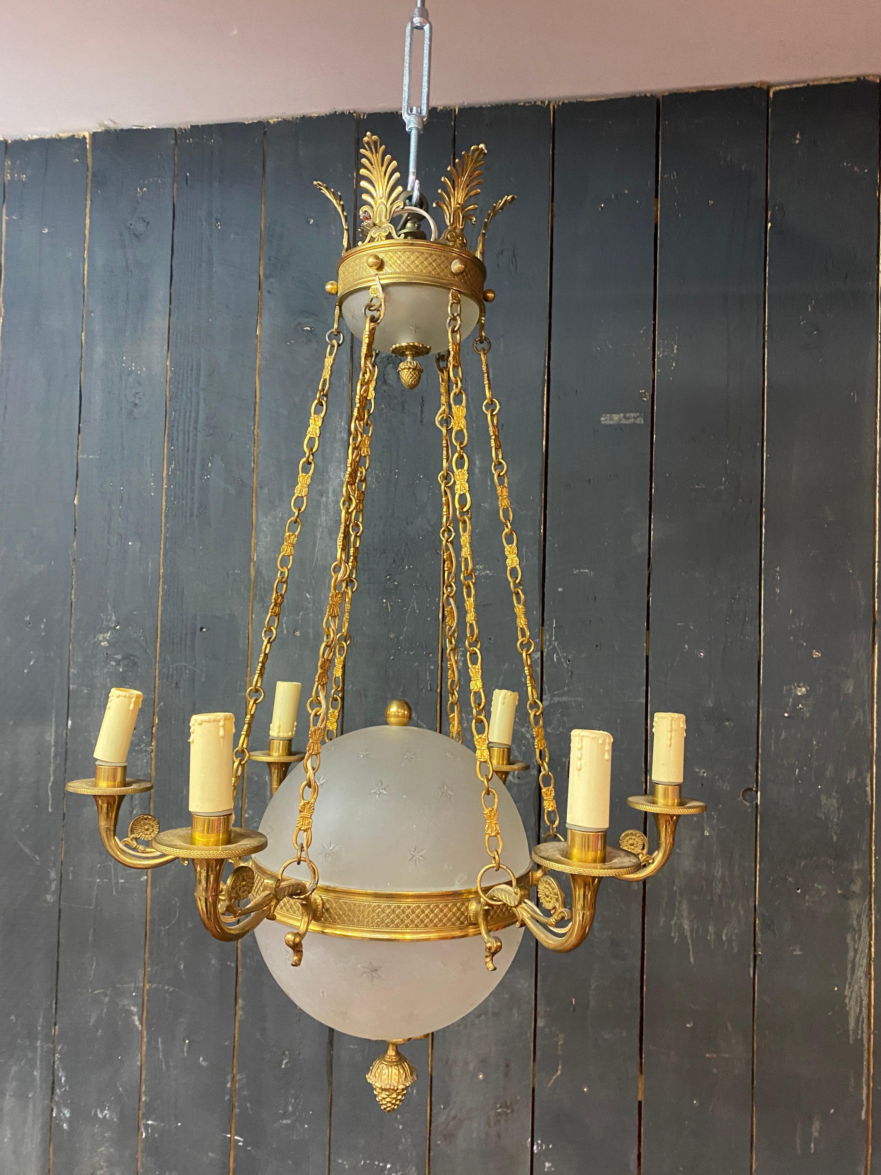 old chandelier in bronze and frosted glass decorated with engraved stars.  For Sale 7