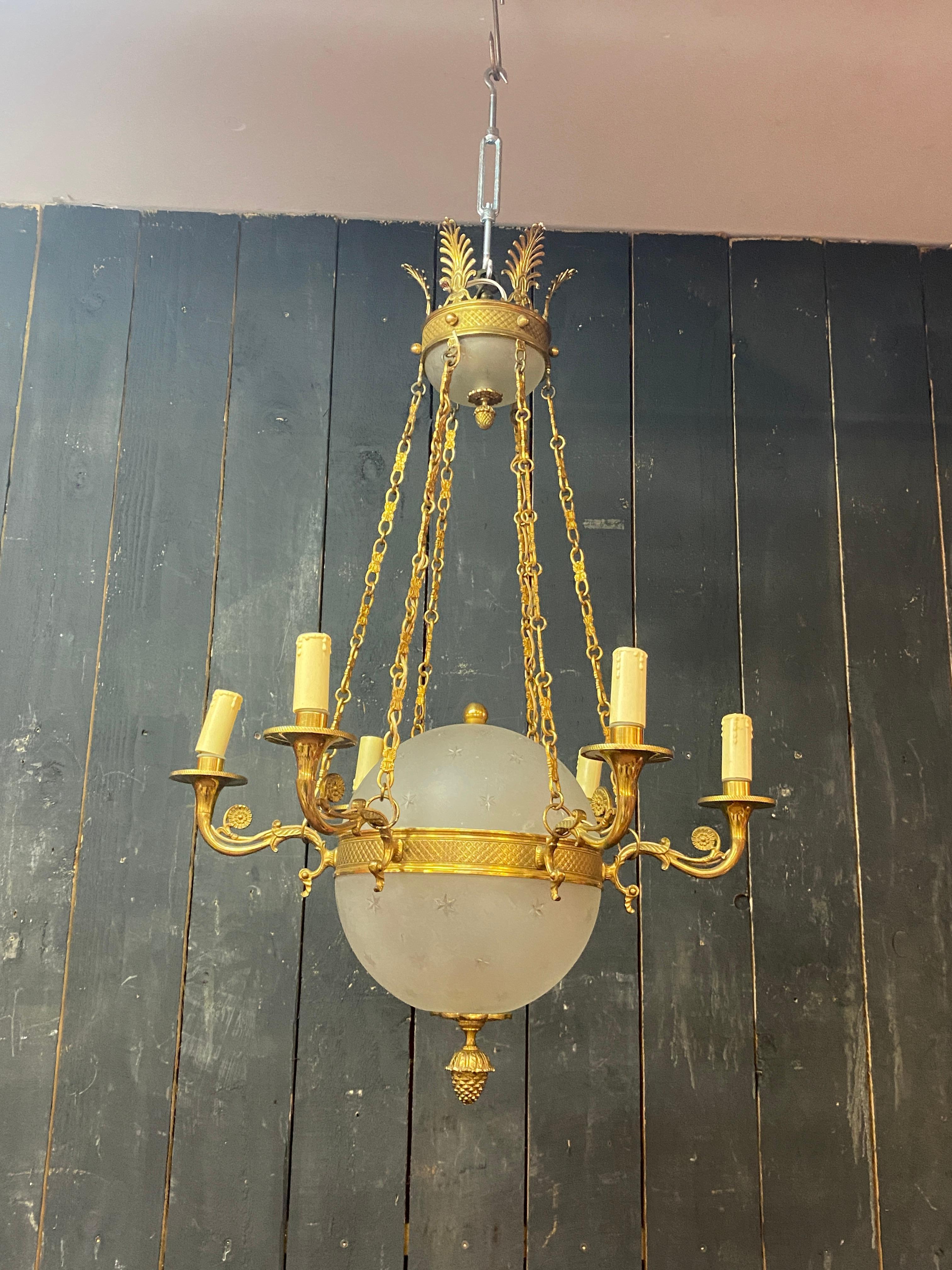 old chandelier in bronze and frosted glass decorated with engraved stars.  For Sale 8