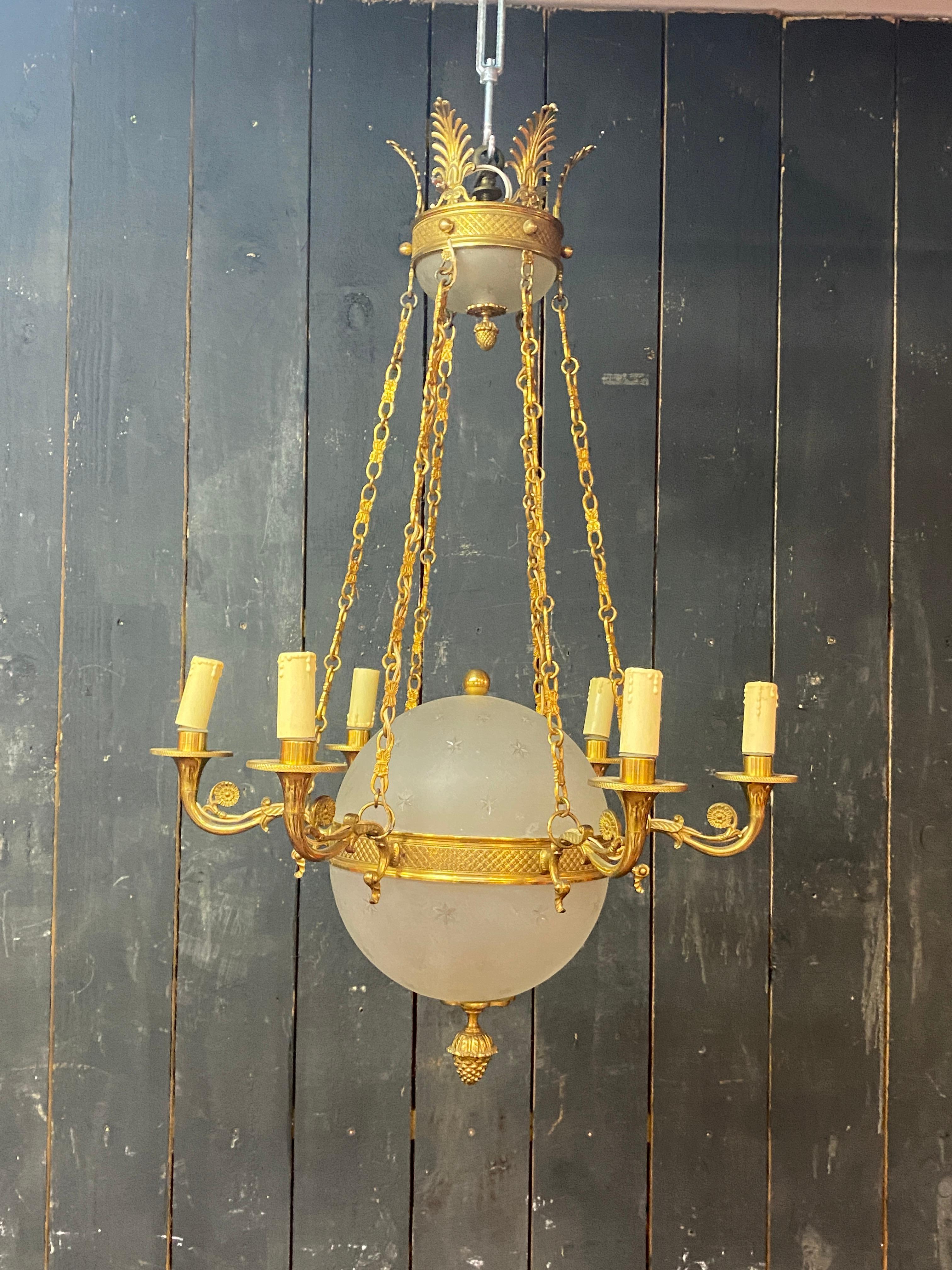 old chandelier in bronze and frosted glass decorated with engraved stars.  For Sale 9