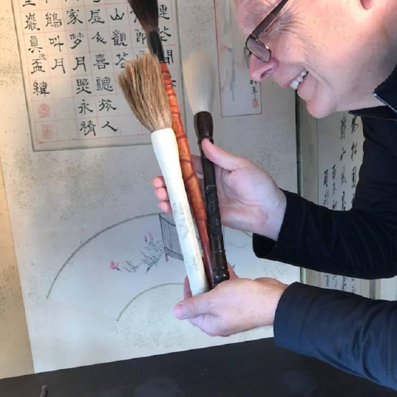 Here's a rare find from a collector we recently visited in Japan. 

These three substantial large scale Chinese calligraphy wooden ink wash painting brushes come from a an old artists collection. 

These amazing old brushes measure up to a whopping