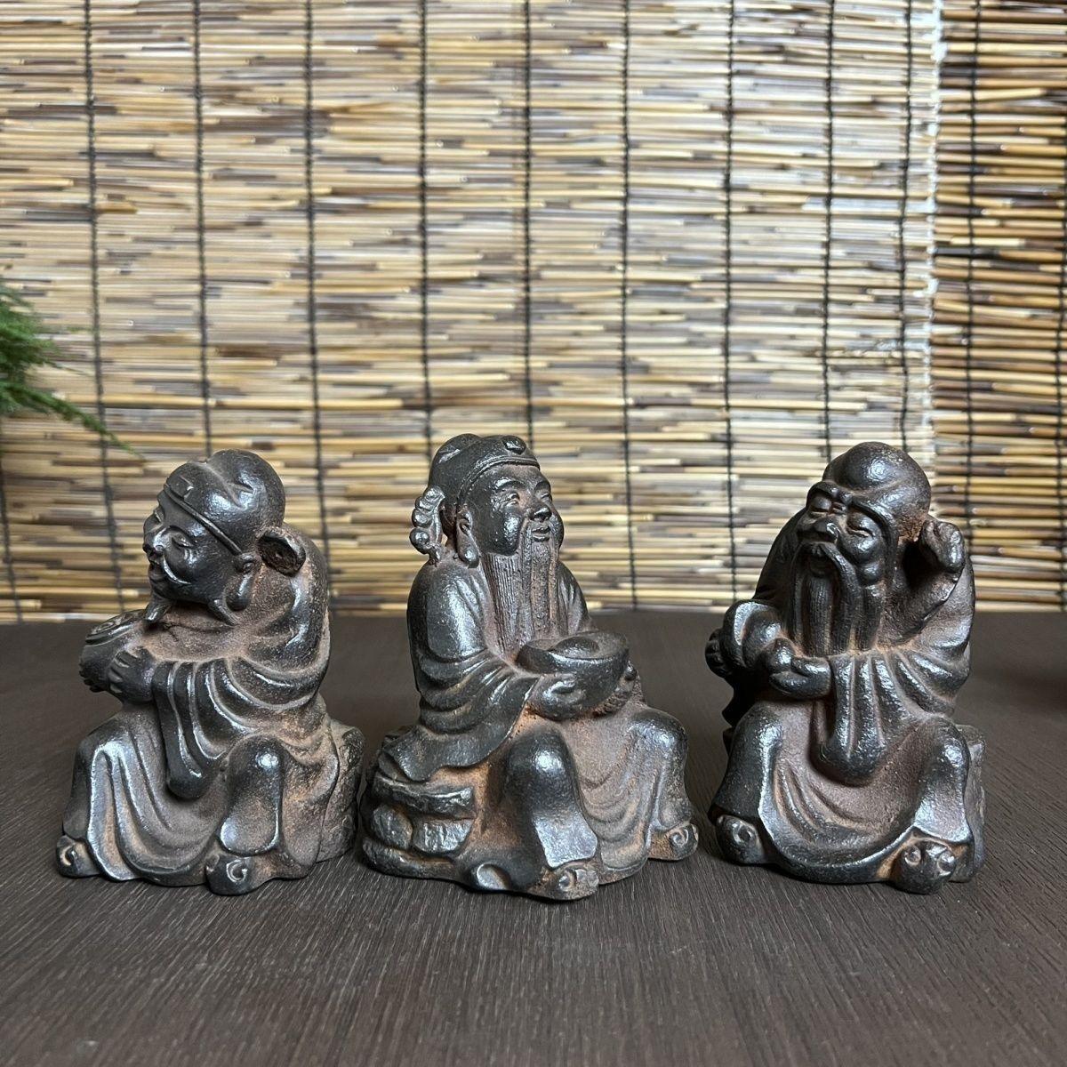 This exquisite set of three statues represents the revered Chinese deities for Wealth (Cai Shen), Fortune (Fu Xing), and Longevity (Shou Xing). Each figure is finely crafted, showcasing traditional Chinese artistry and auspicious symbolism. These