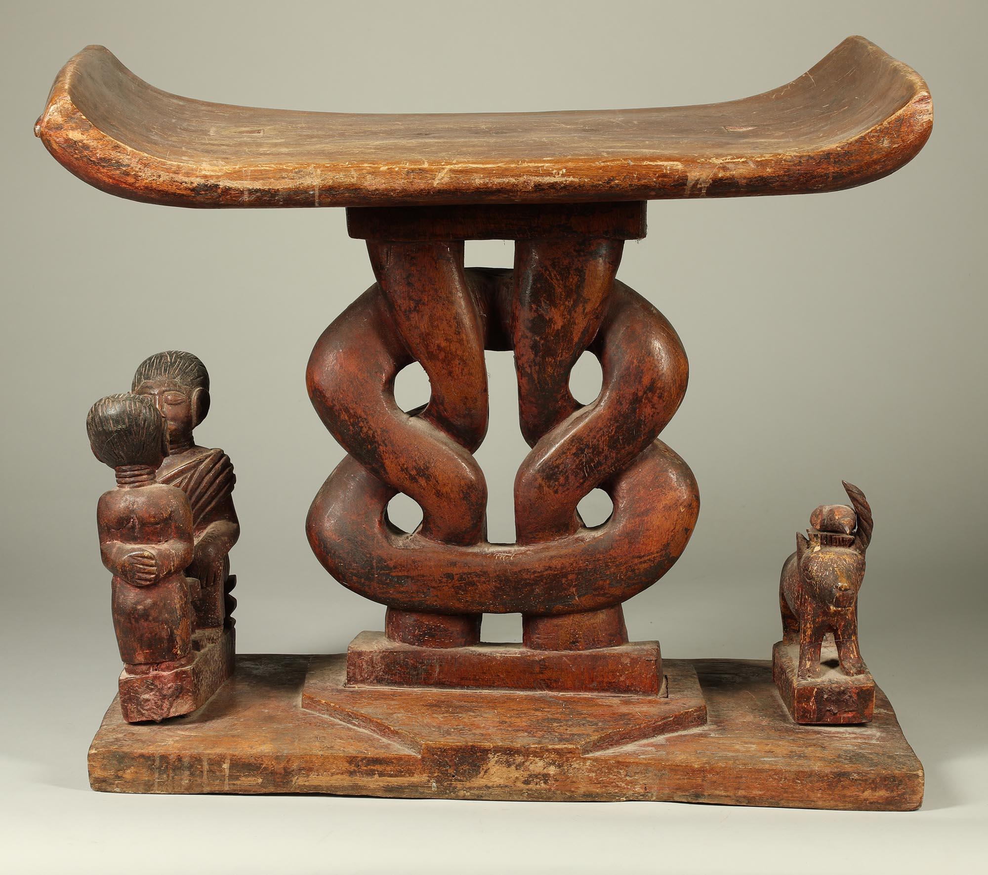 The supports for Akan stools take many forms, they can be purely geometric or architectural with simple posts and columns, or, as in this case, an endless knot form supporting the curved seat.
Created in the early to mid-20th century, by an