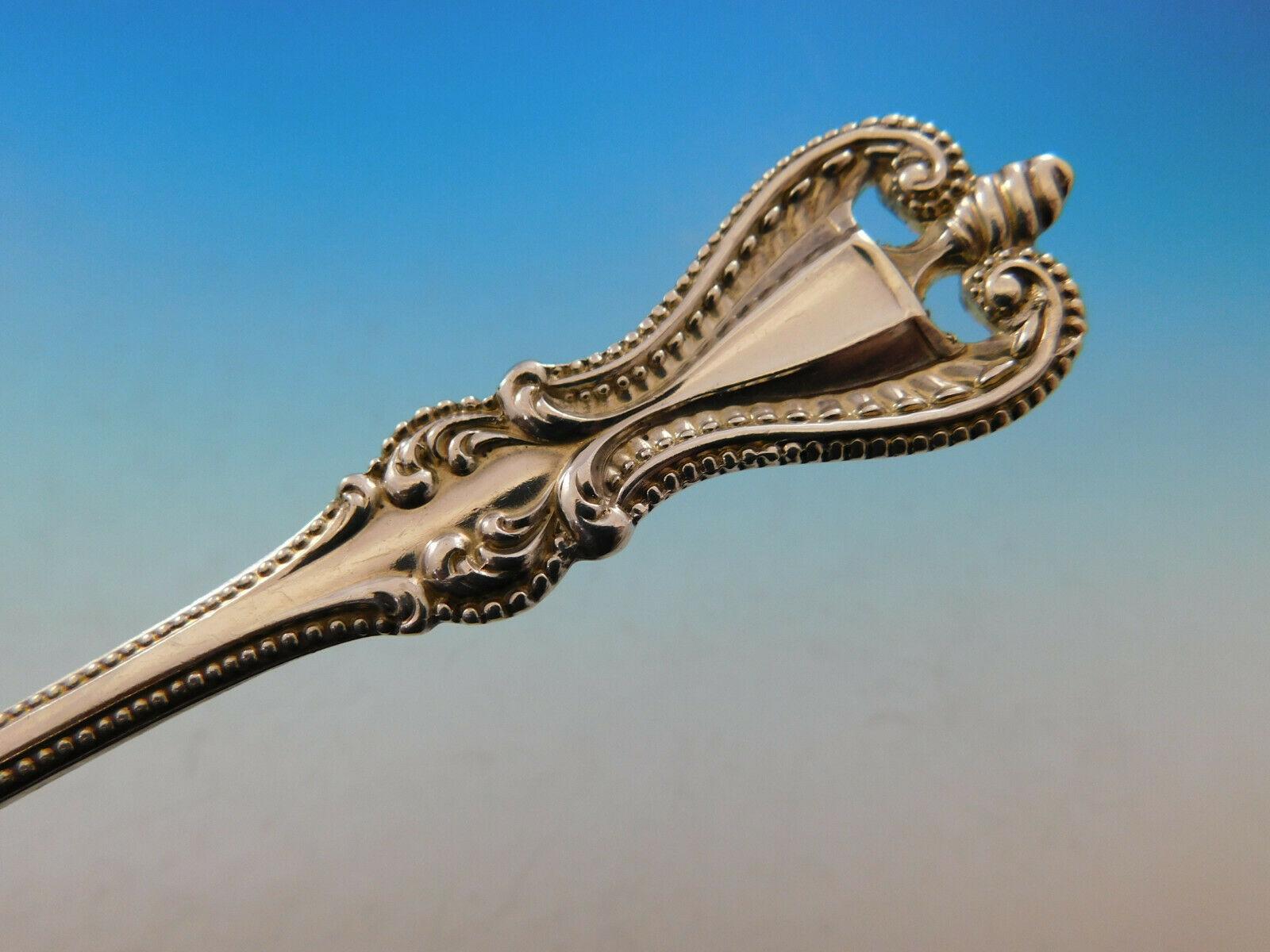 Lavishly decorated, Old Colonial's graceful curves descend along a beaded handle. Representing the height of the silversmith's craft, Old Colonial is a peerless expression of sophistication in sterling.

Monumental dinner size Old Colonial by Towle