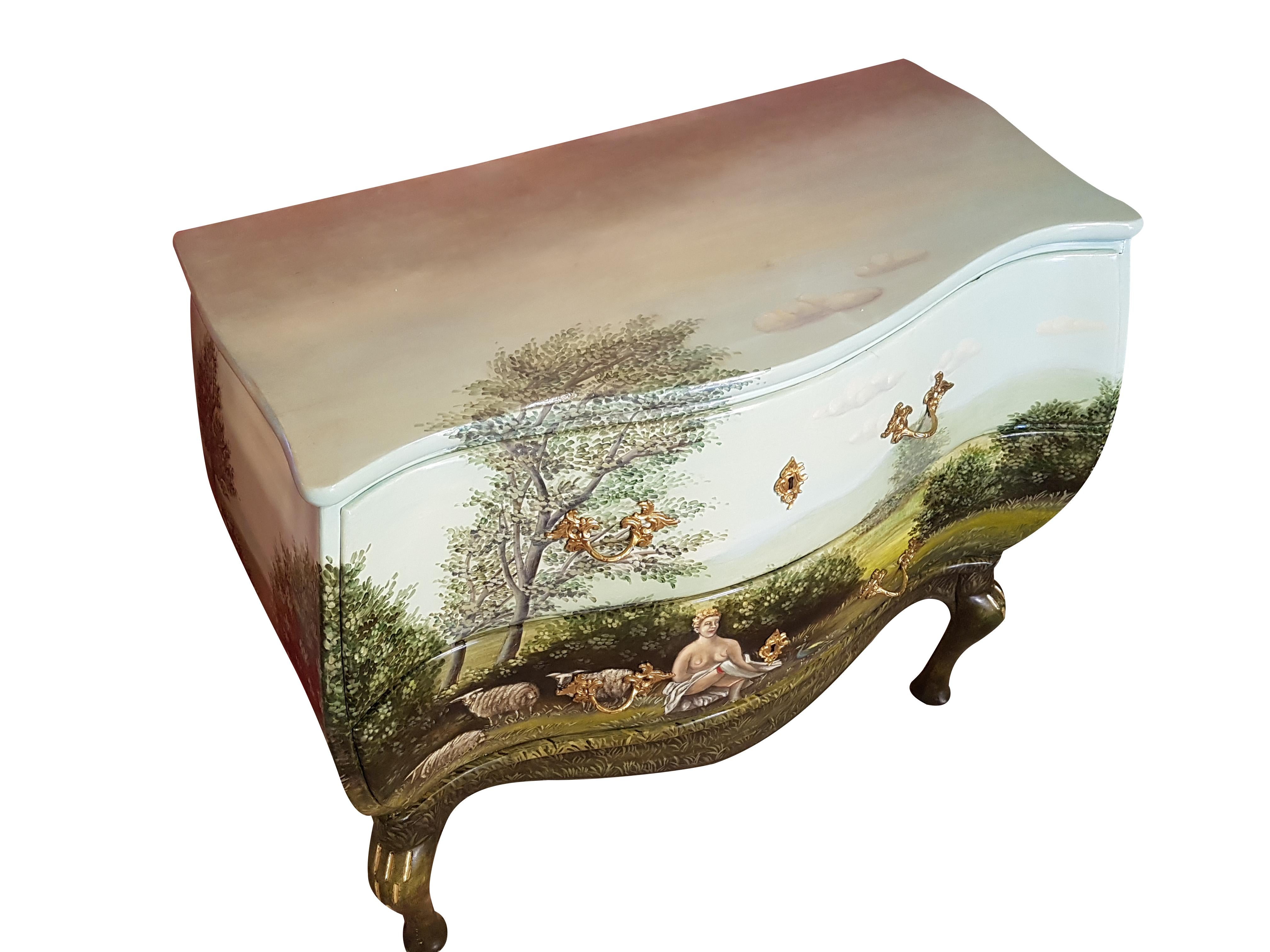 This old commode from the first half of the 20th century was carefully restored and painted by the artist M. Wetter with a romantic park landscape in oil paint and also signed. The landscape shows a woman and three sheeps on an idealized park