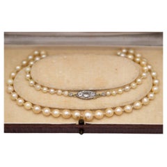 Antique Old cultured pearl necklace with gold-platinum clasp with old European diamonds.