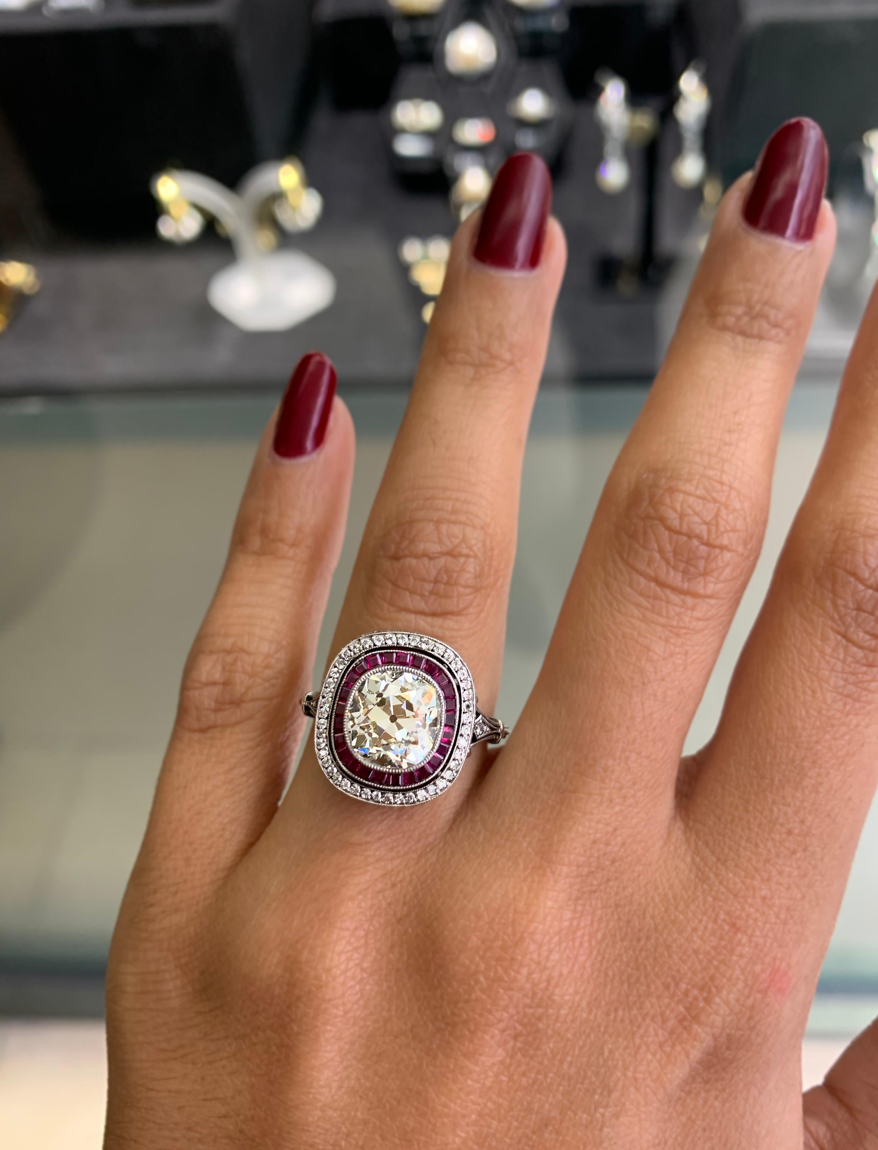 Women's Old Cushion Cut Diamond and Ruby Engagement Ring